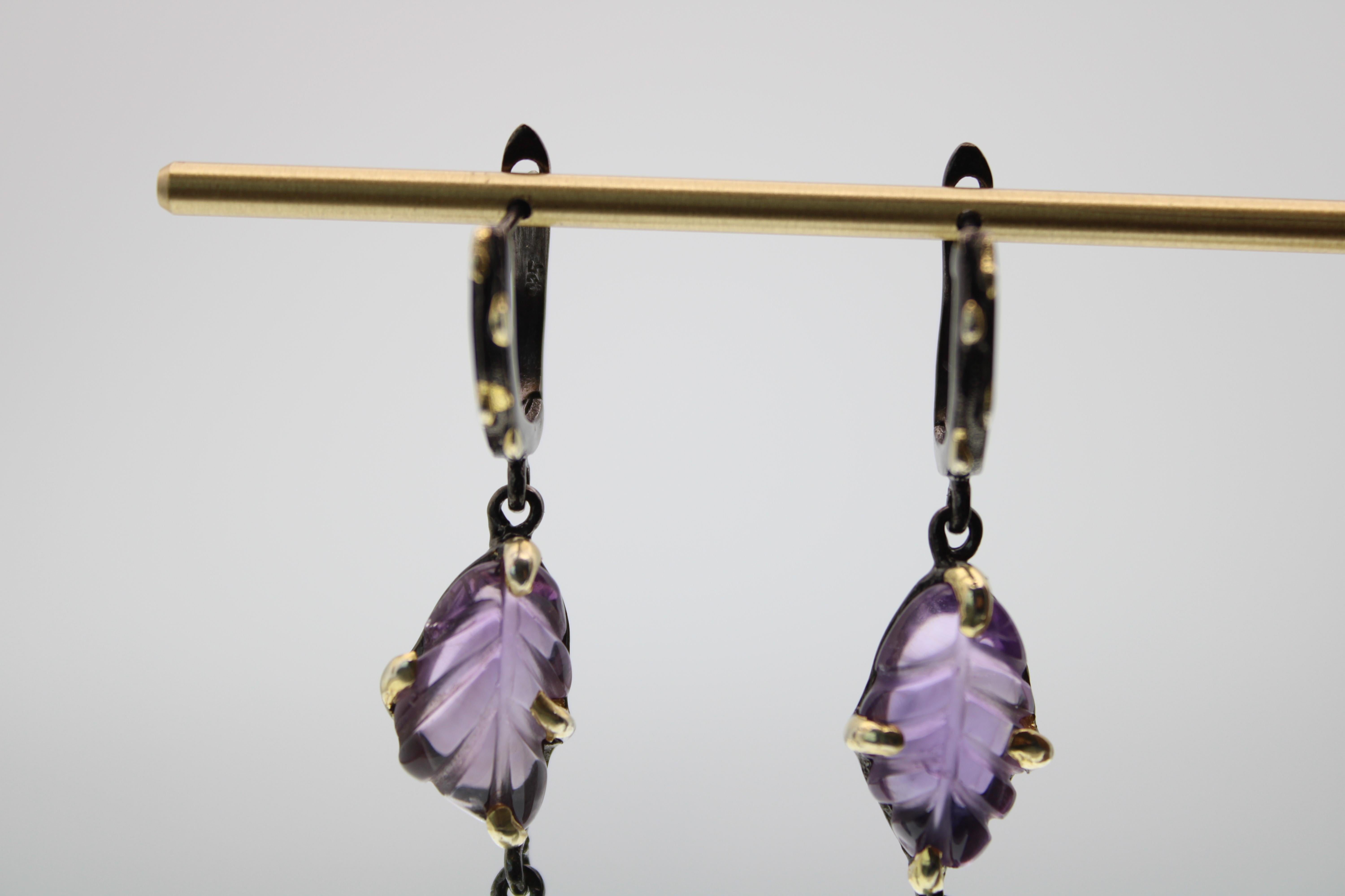 Aventurine & Amethyst Stone Dangle Earrings with Leaf cut. These earrings are gold & rhodium plated over sterling silver. The color of the stones are beautiful as the light reflects against them. They have about a 2 1/2