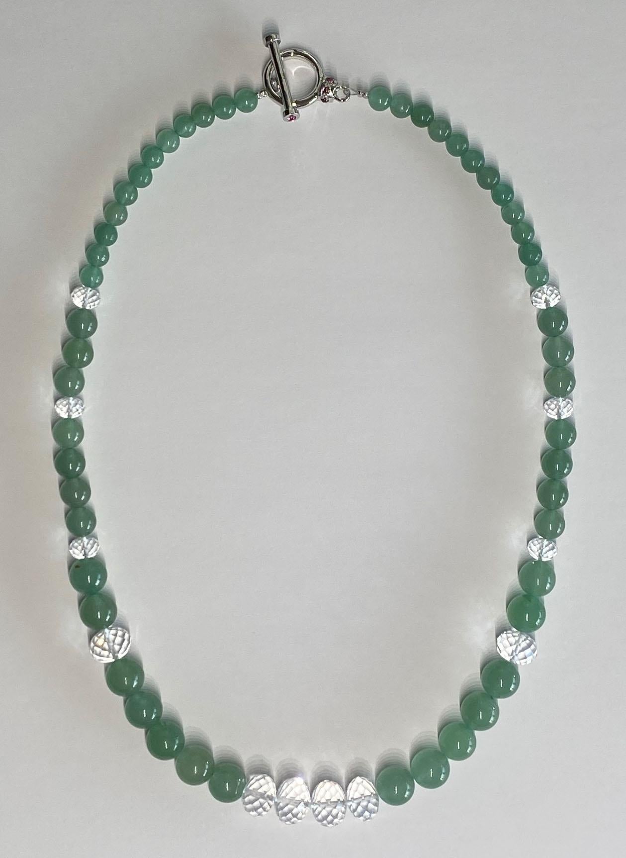 Kary Adam Designed, Aventurine & Quartz Faceted Rondelle Necklace with a Silver T-Bar clasp. Clasp is set with small Pink Tourmaline Cabochons.

Originally from San Diego, California, Kary Adam lived in the “Gem Capital of the World” - Bangkok,
