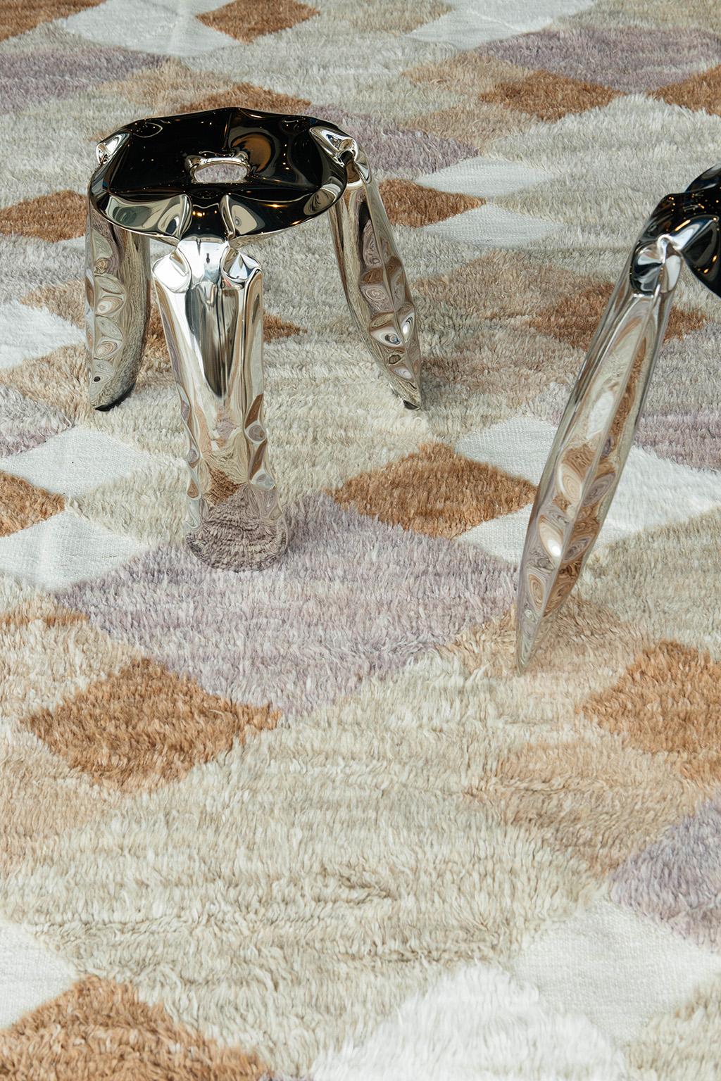 Avesta is a color blocking hand knotted rug that brings character and light to the space. The design is created with embossed detailing through the low shag pile. Inspired by Scandinavian design elements and designed in Los Angles with extreme