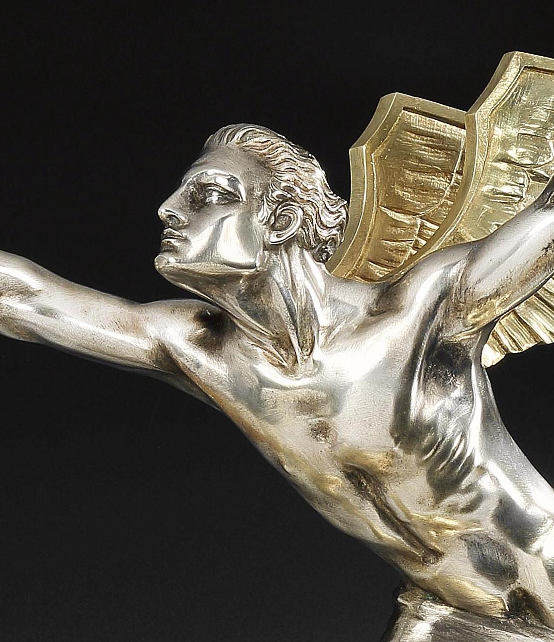 A highly evocative Art Deco bronze, depicting a typical ‘Speed God’ by French sculptor Frederic C. Focht (1879-1937). The silvered and gilded bronze portrays the sculptor’s willingness to embrace the Machine Age in a period of history where the