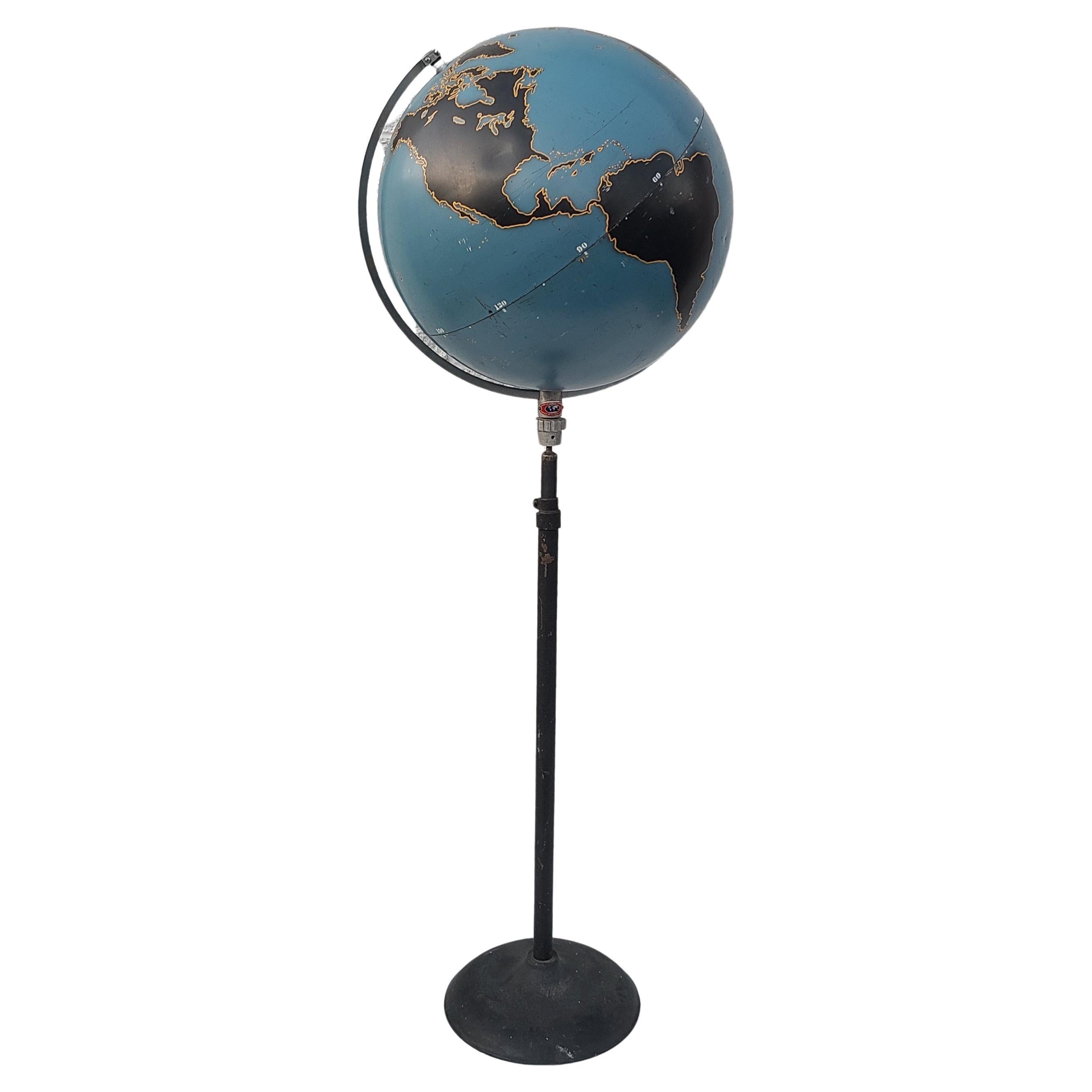 Please message us for a cost effective shipping quote to your location.

Aviator Floor Globe by Denoyer-Geppert. Black continents and open oceans for use in training. This globe has a depression in North America.
