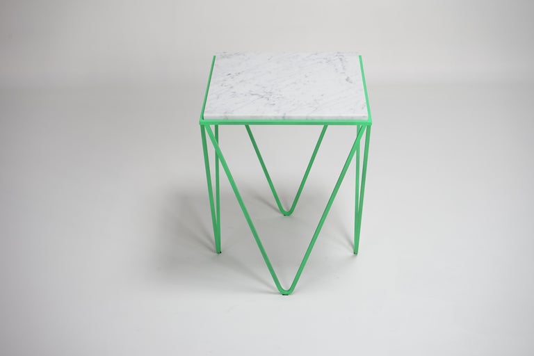 Avior is an evolution of the Gravity side table. We decided to keep the same concept of lightness and movement, abstracting the motion of the flying Carrara marble into a different 3D iron structure. 

The geometry was achieved through playful