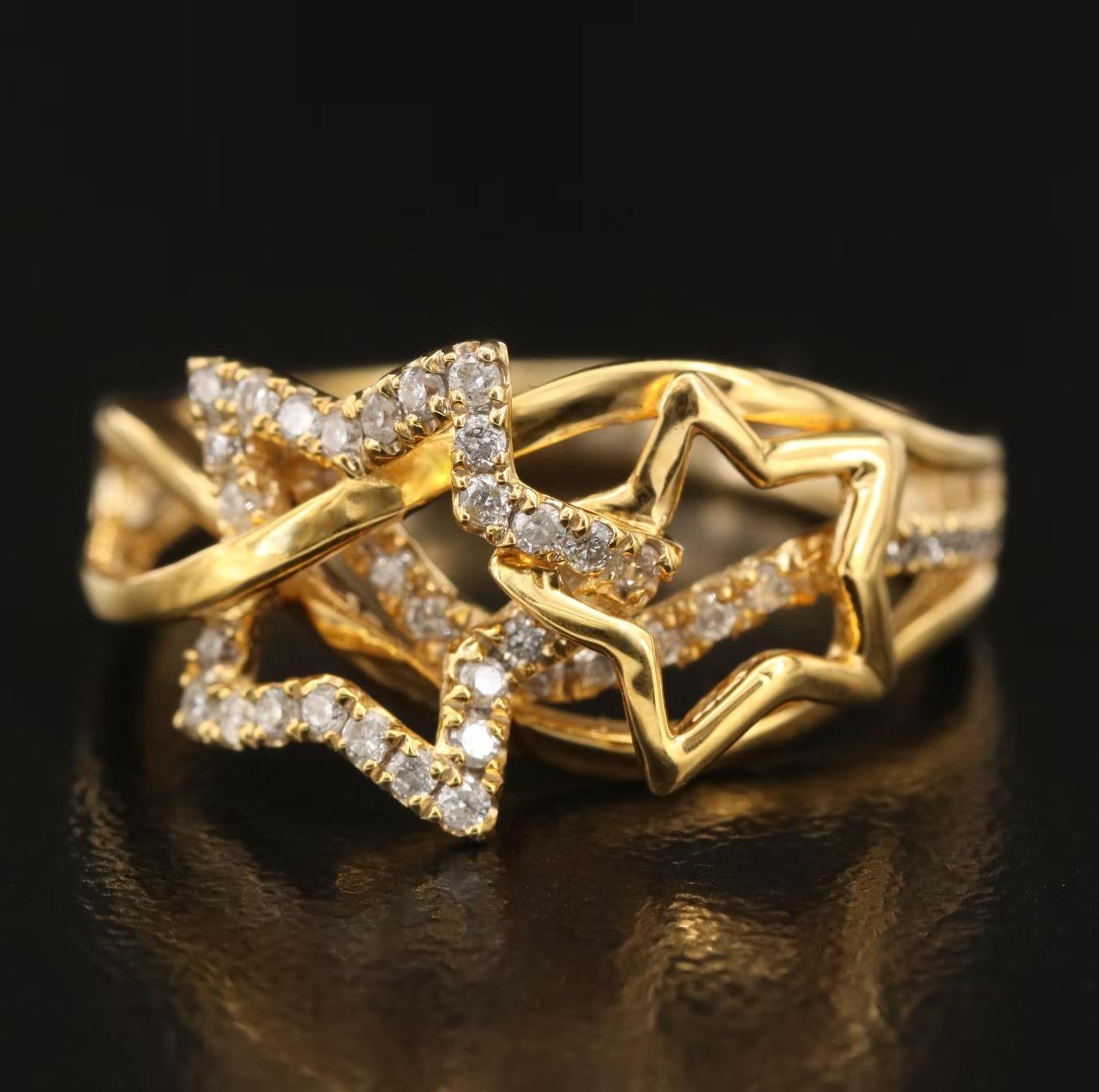 AVJX House of Design NY, stamped and hallmarked with the designer Hallmarks

NEW WITH TAGS, Tag Price $3750

Amazing 3D star Star design with diamond

0.35 CT of High Quality Diamond (G / SI diamond), high quality colorless
        
14K Yellow gold,