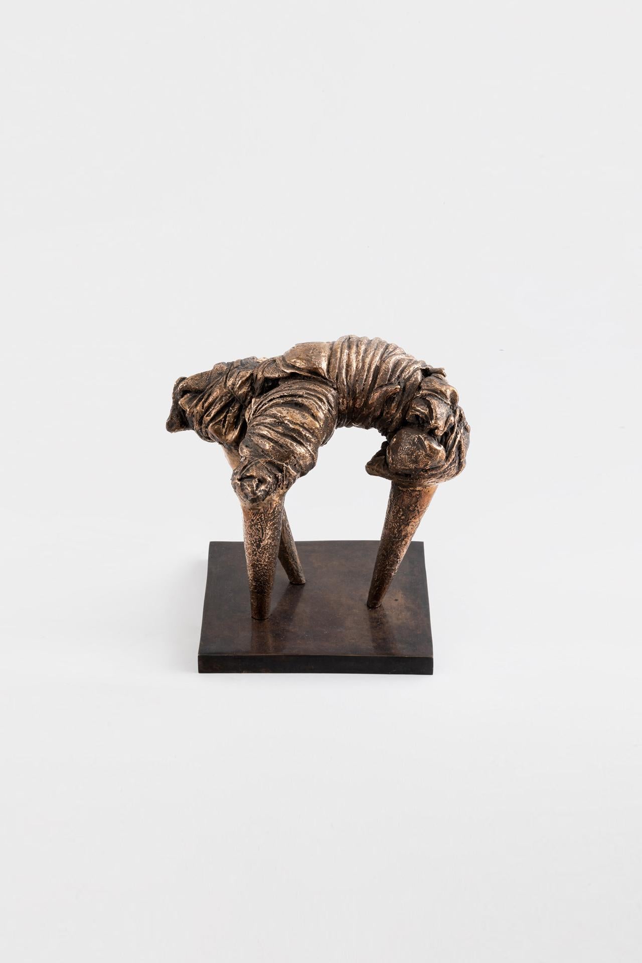 Avoidance. Like a man on stilts, a figure squirming on its conical legs. A larva struggling to get out of its cocoon. This intimate withdrawal, physical and cerebral, ultimately favours individuality. 

*80% recycled bronze
*Wanderart metal-cast