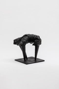 Avoidance, contemporary sculpure in cast bronze, black patina