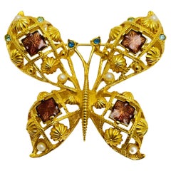 broche de diseño mariposa esmalte dorado firmado AVON
