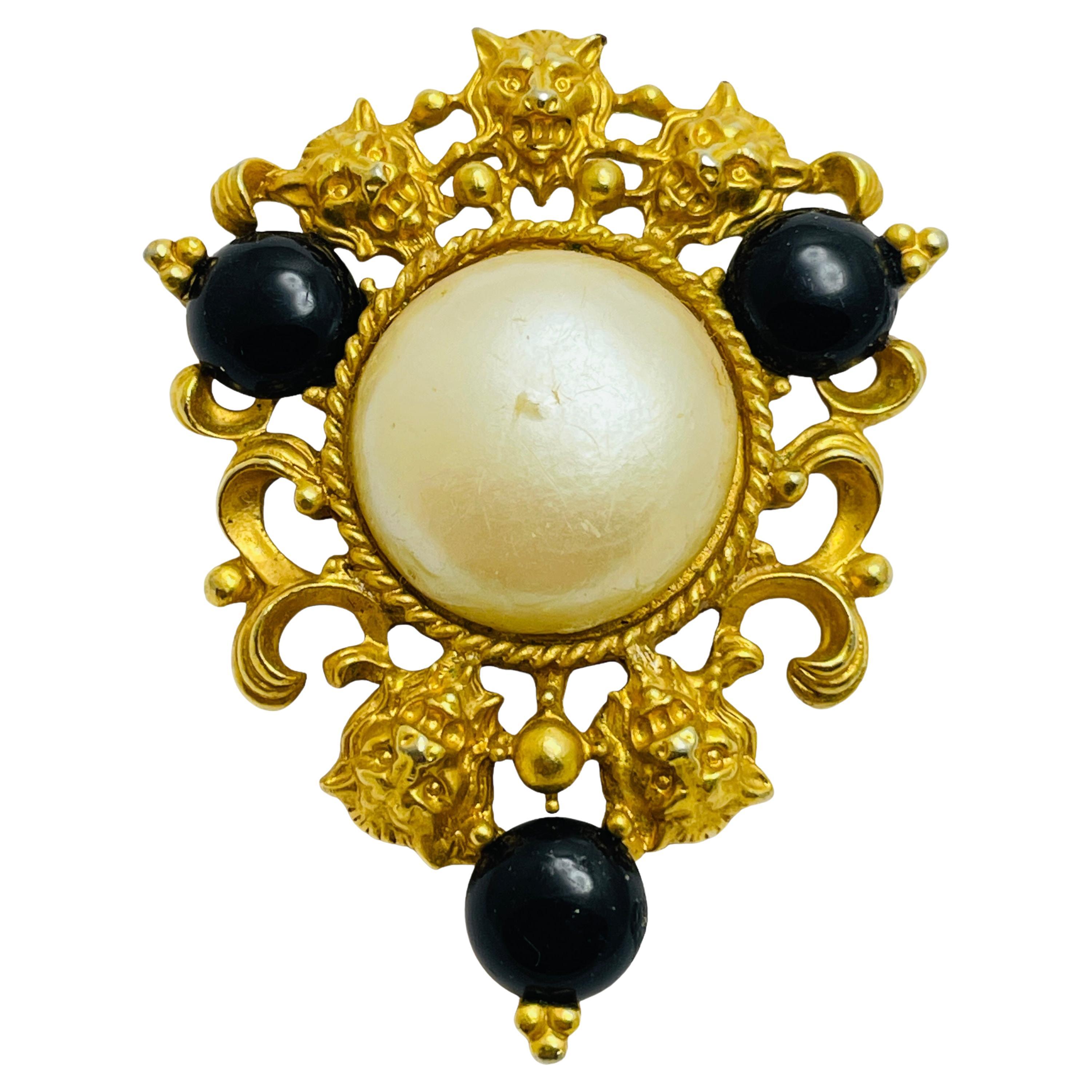AVON signed lions gold tone faux pearls designer brooch For Sale