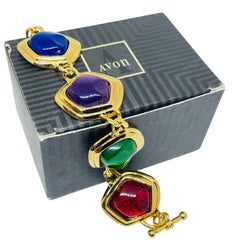 Avon signé vintage plaqué or jewelers verre coulé bracelet designer