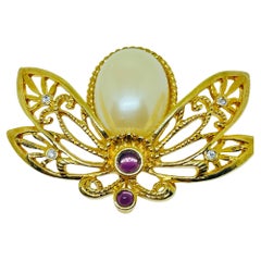 AVON signed vintage gold tone pearls amethyst eyes bee bug designer brooch AVON signed vintage gold tone pearls amethyst eyes bee bug designer brooch