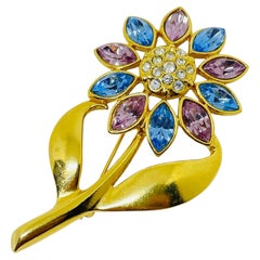 Avon vintage broche fleur en strass ton or designer