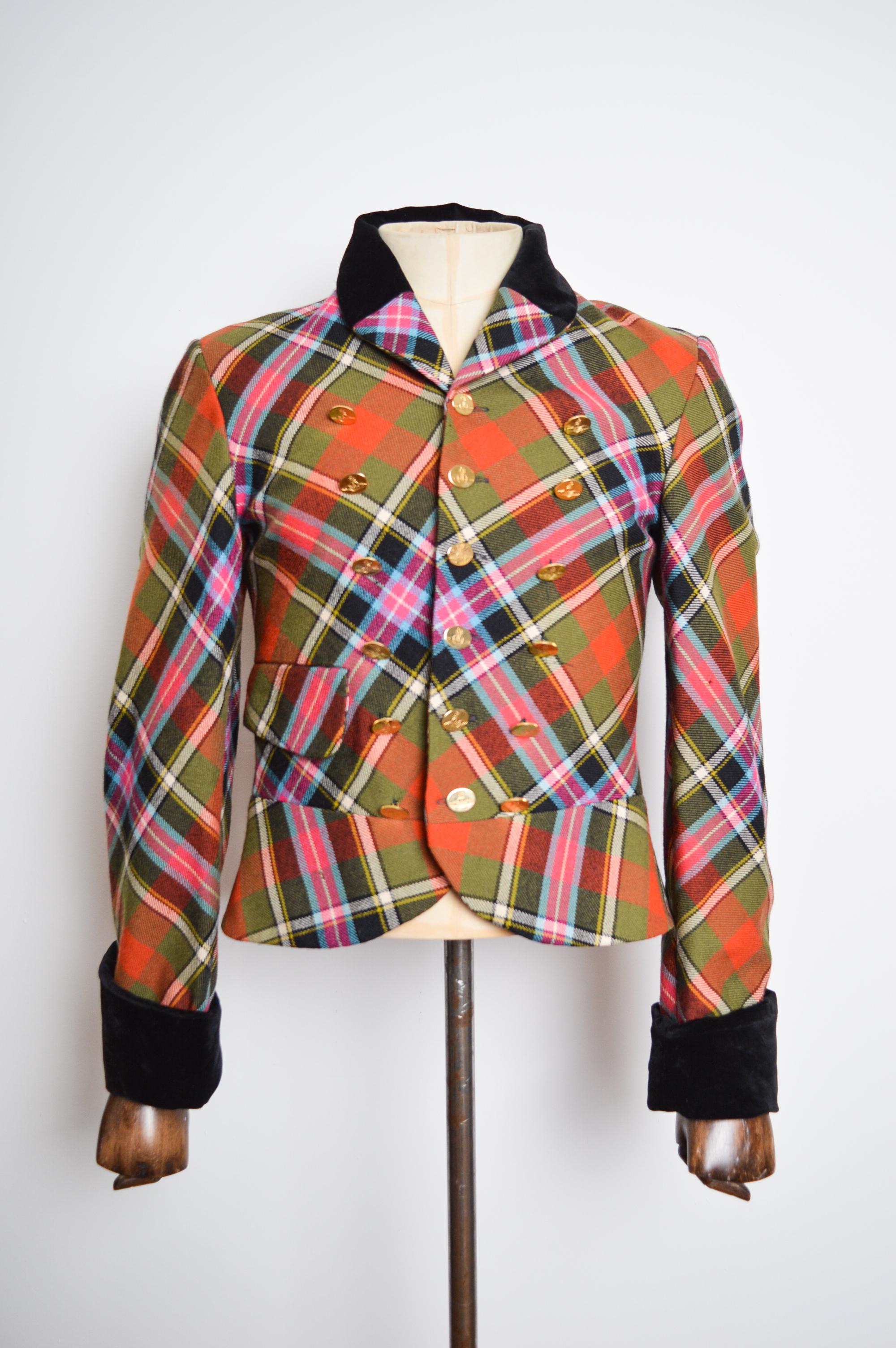 Superb Vivienne Westwood 'Bruce of Kinnaird' Tartan mens jacket from the AW 1988/ 89 'Time Machine' Collection.

MADE IN ENGLAND.  

Features: Velvet Collar, Long sleeves, Satin lined interior, 18 Individually Embossed Orb Buttons, Single hip pocket