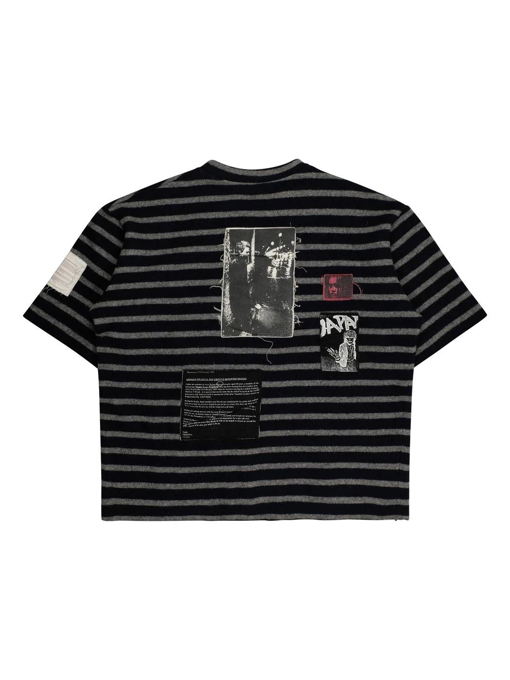 An extremely rare short sleeve sweater from Raf Simon's AW01 collection. This piece of striped knitwear features patches throughout with different pieces of artwork and script.

Size 50

