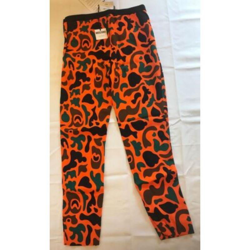 Women's AW15 Moschino Couture Jeremy Scott Orange Brown Green Camouflage Pants 40 IT For Sale