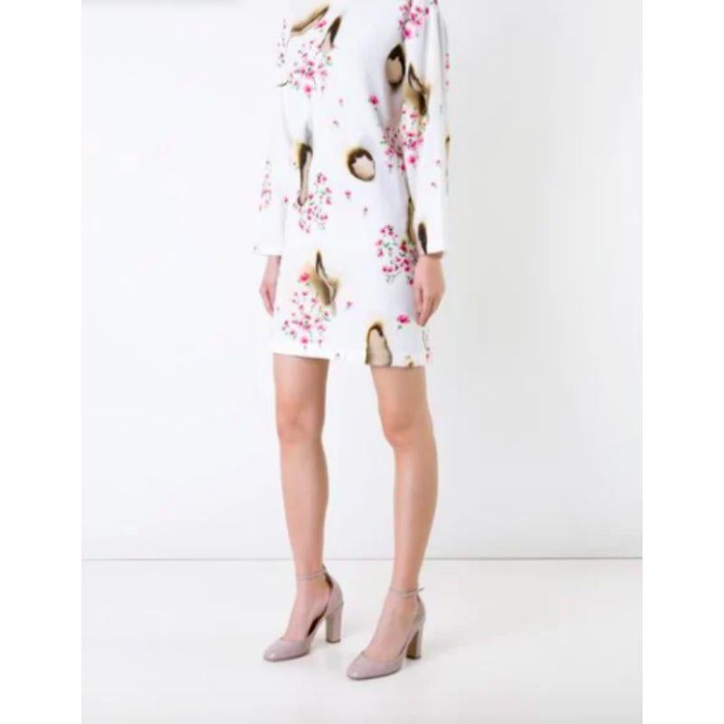 AW16 Moschino Couture Jeremy Scott Burnt Effect Floral White Rayon Dress

Additional Information:
Material: 100% Rayon
Color: Multi-color    
Pattern: Floral
Style: Slip Dress    
Size: IT S = 40
Theme: Fashion Kills Burn Effect
100%