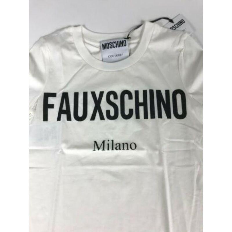 AW17 Moschino Couture Jeremy Scott Fauxchino Milano White Cotton T-shirt

Additional Information:
Material: 100% Cotton    
Color: White / Black
Pattern: Fauxchino
Style: T-Shirt
Size: 38 IT
100% Authentic!!!
Condition: Brand new with tags