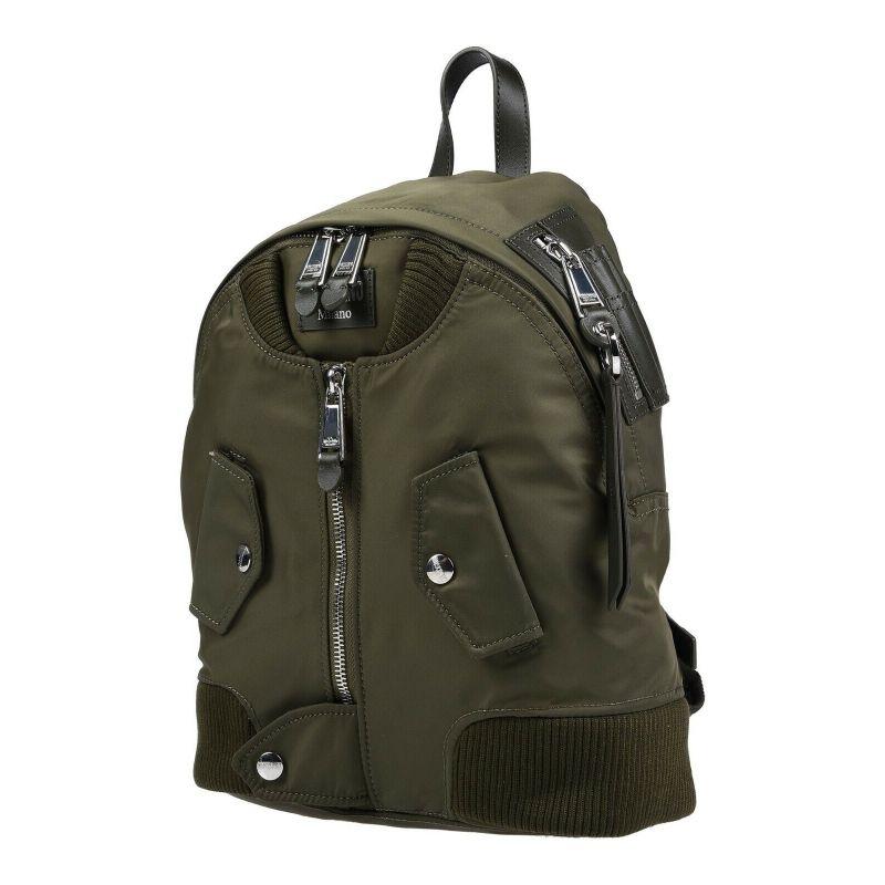 AW17 Moschino Couture Jeremy Scott Green Bomber Jacket Backpack Silver Hardware

Additional Information:
Material: 90% Nylon backpack with 10% leather
Color: Green/Silver
Pattern: Military Green/Silver
Style: Backpack
Dimension: 12.5 W x 5.5 D x