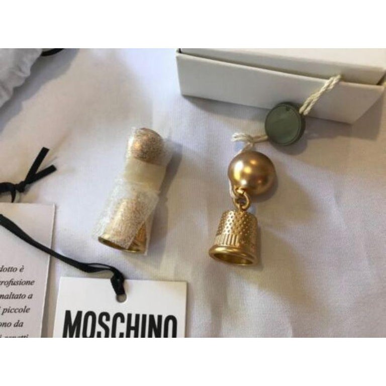 AW17 Moschino Couture Jeremy Scott Thimble Clip on Earrings Gold Metal Bijoux  For Sale at 1stDibs