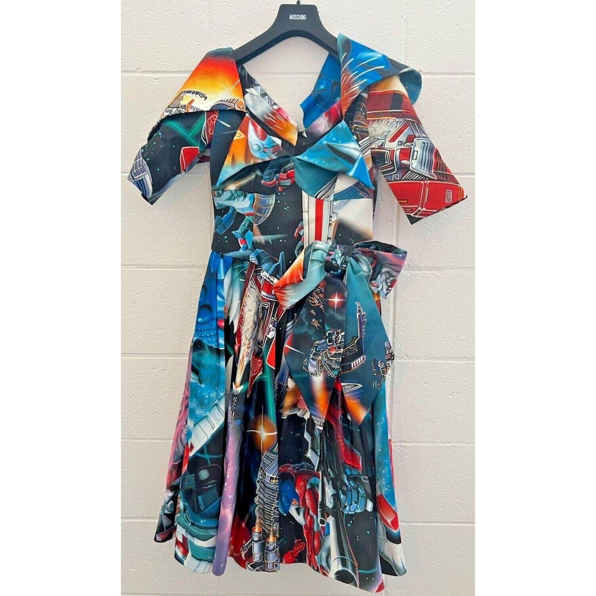 AW17 Moschino Couture Jeremy Scott Transformers Dress Cocktail Gown AllOverPrint

Additional Information:
Material: 100% Polymide
Color: Multicolor
Size: IT 42 / US 8
Style: Cocktail Gown
Pattern: Abstract, Transformers
Dimensions: Bust 15