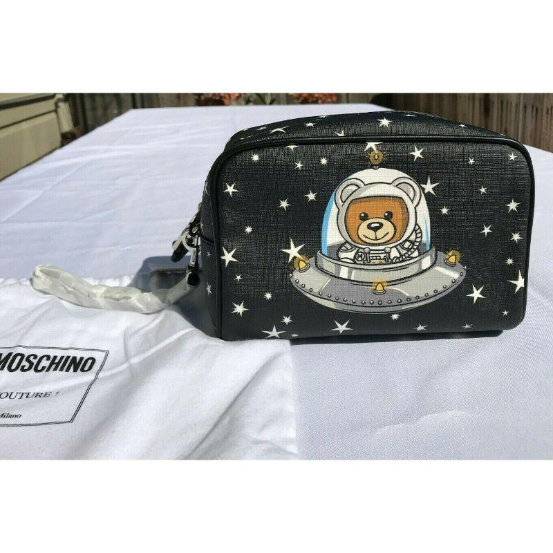 AW18 Moschino Couture Jeremy Scott Ufo Teddy Bear Invasion Black Make Up Bag

Additional Information:
Material: 100% Polyurethane
Color: Black & Multicolor
Style: Make Up Bag
Dimension: 8 W x 3.9 D x 5.1 H in
100% Authentic!!!
Condition: Brand new