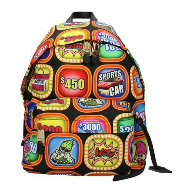 AW19 Moschino Couture Jeremy Scott Game Show Troll Adjustable Straps Backpack

Additional Information:
Material: 100% PL, Leather Details      
Color: Multi-color
Style: Backpack
Dimension: 9.4 W x 5.9 D x 13.7 H in
Character Family:    Cars,