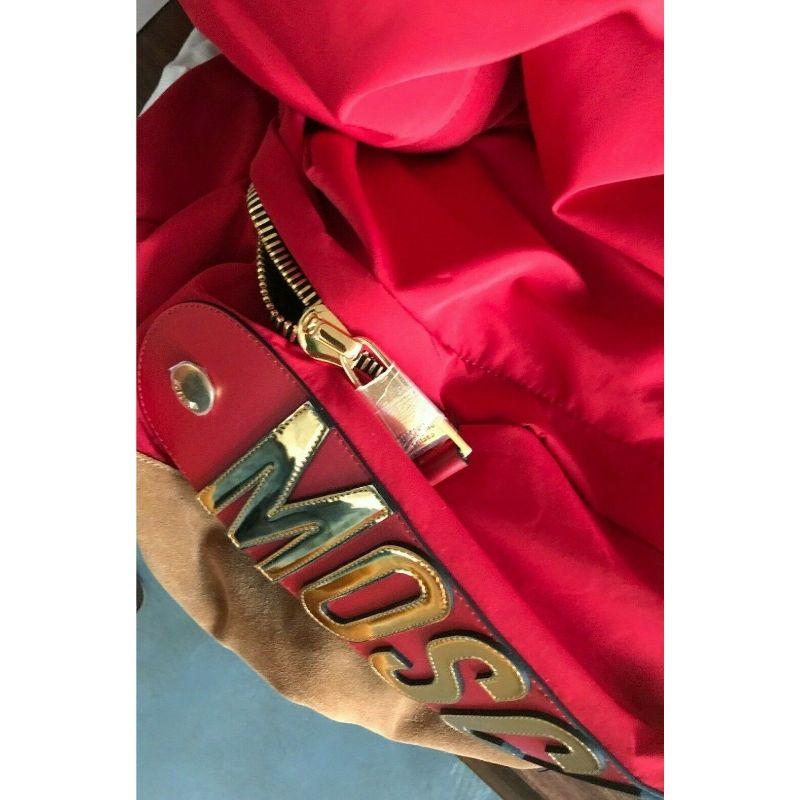 AW20 Moschino Couture Jeremy Scott Oversized Giant Red Backpack W/ Gold Logo

Additional Information:
Material: Textile, Gold-tone Metal
Color: Red/Brown/Gold
Pattern: Oversized Backpack
Style: Backpack
Accents: Metal Logo Lettering
Features: Top