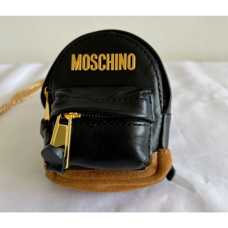 AW20 Moschino Couture Mini Leather Black Backpack/keychain/belt bag/shoulder bag

Additional Information:
Material: Leather
Color: Black, Gold
Size: Mini
Style: Shoulder Bag
Dimensions: 3.75
