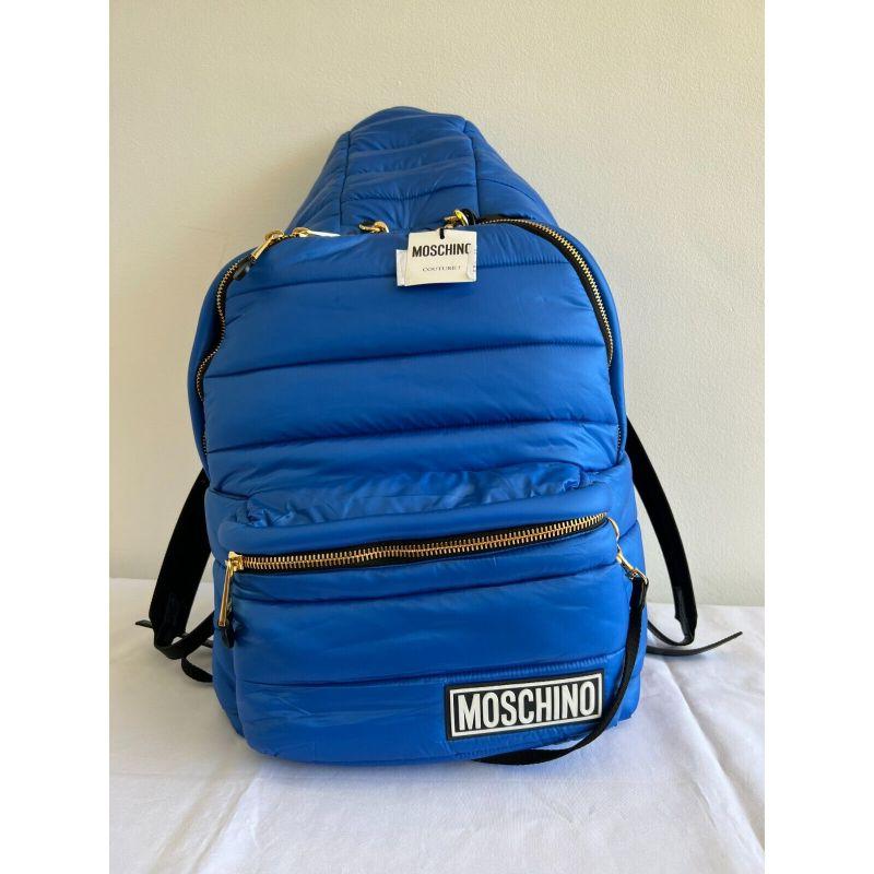 AW20 Moschino Couture Jeremy Scott OVERSIZED Blue Backpack with Attached Hoodie

Additional Information:
Material: Nylon, Silk
Color: Blue, White, Black
Pattern: XL Backpack with attached hoodie
Style: Backpack
Dimensions: 19