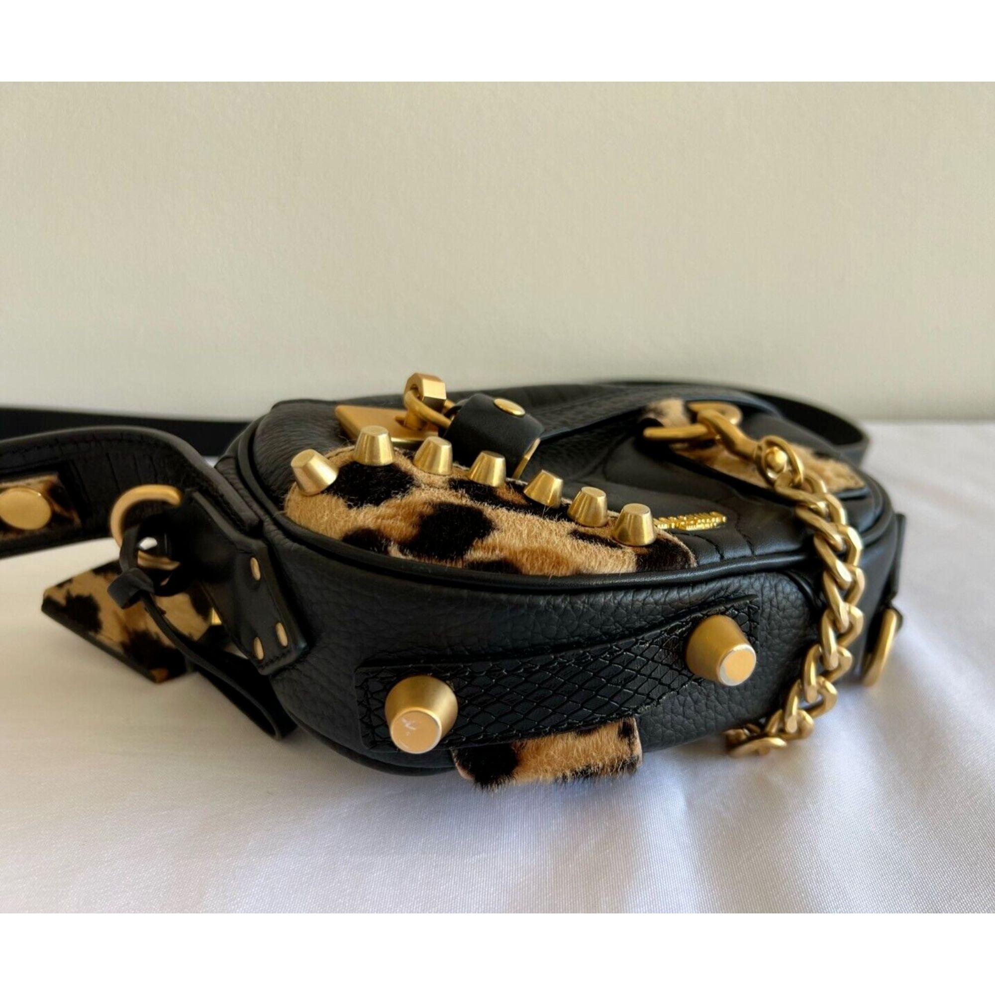 Women's AW21 Moschino Couture Gold Leopard Black Leather Shoulder Bag by Jeremy Scott For Sale