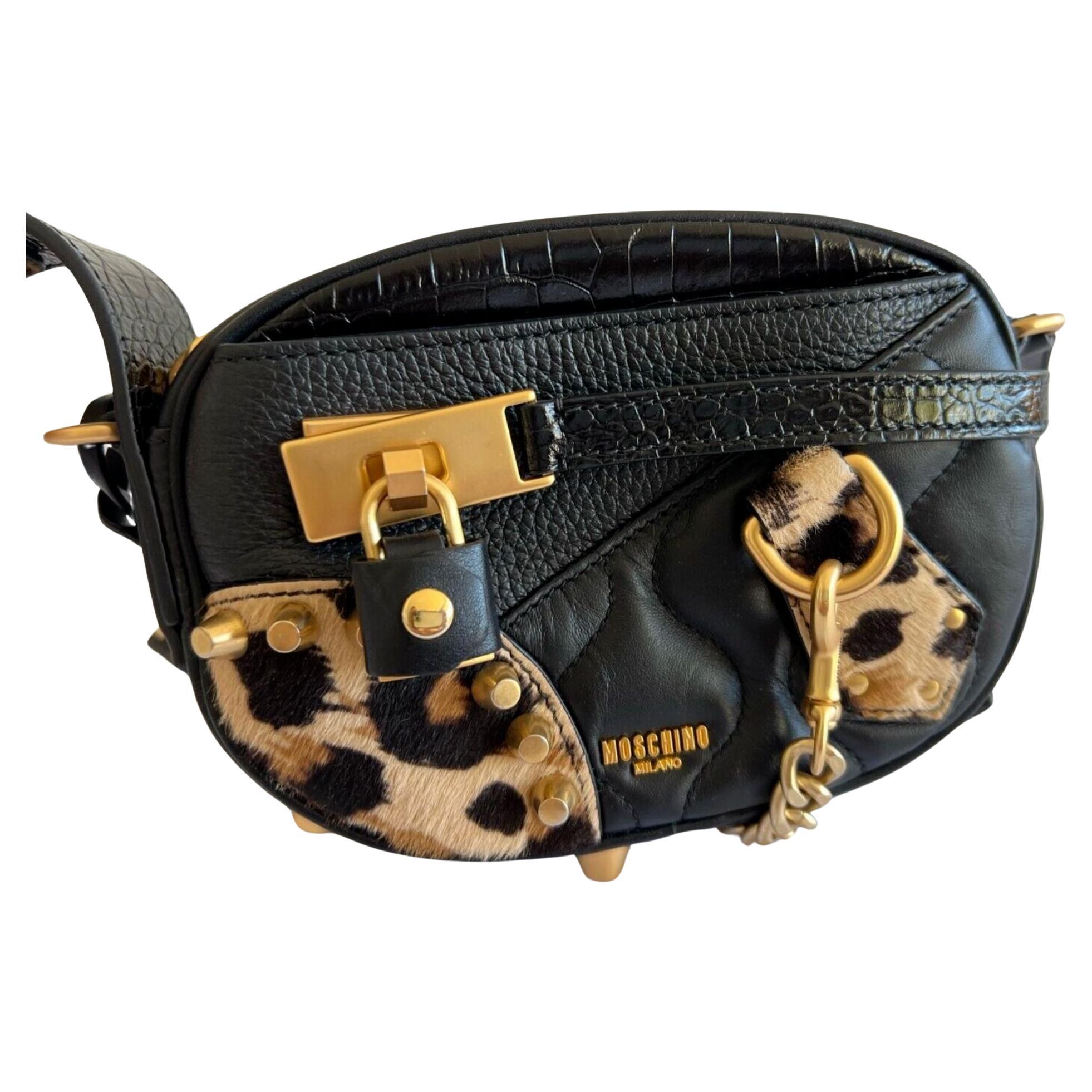 AW21 Moschino Couture Gold Leopard Black Leather Shoulder Bag by Jeremy Scott For Sale