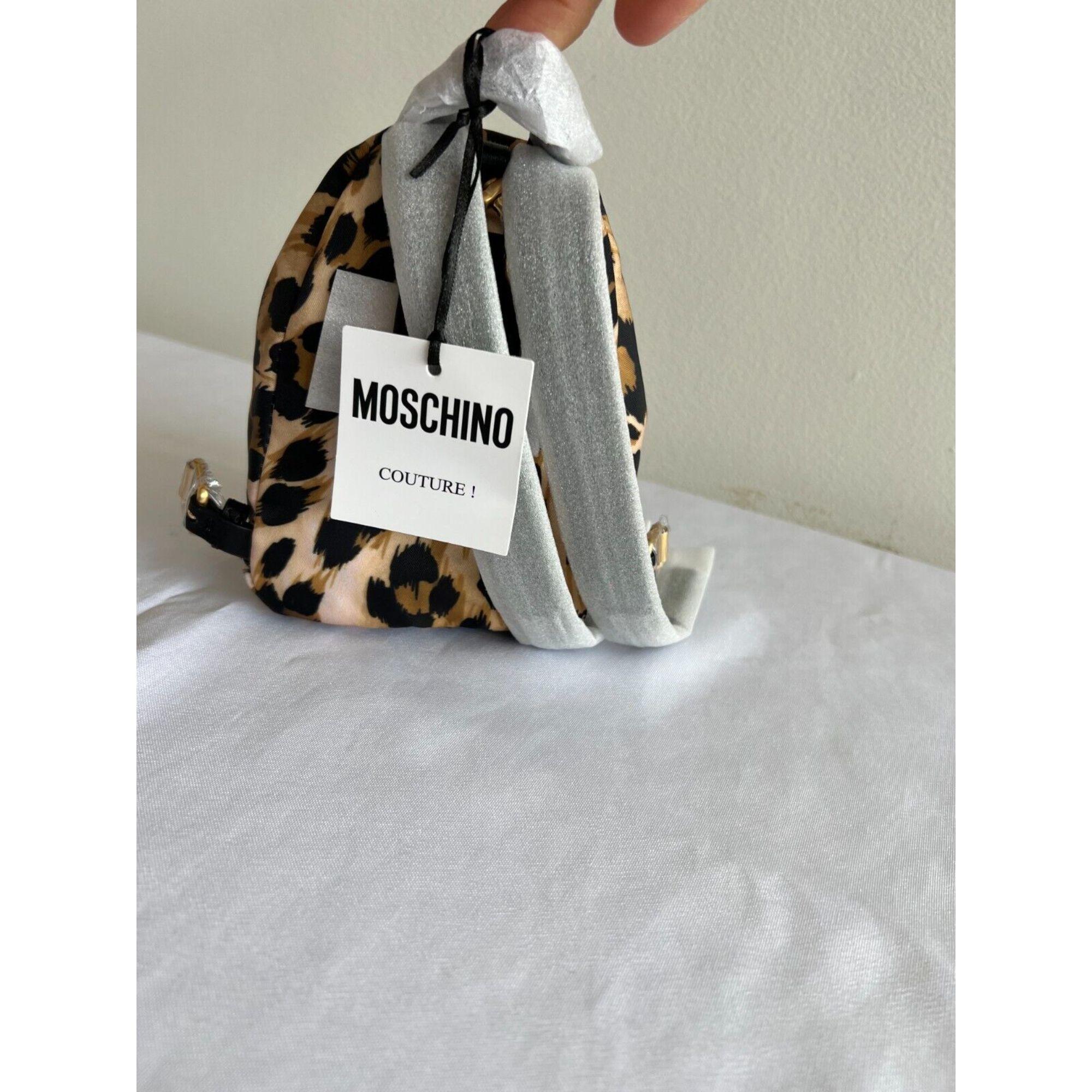 Black AW21 Moschino Couture Leopard Print Shoulder Bag Mini Backpack by Jeremy Scott For Sale