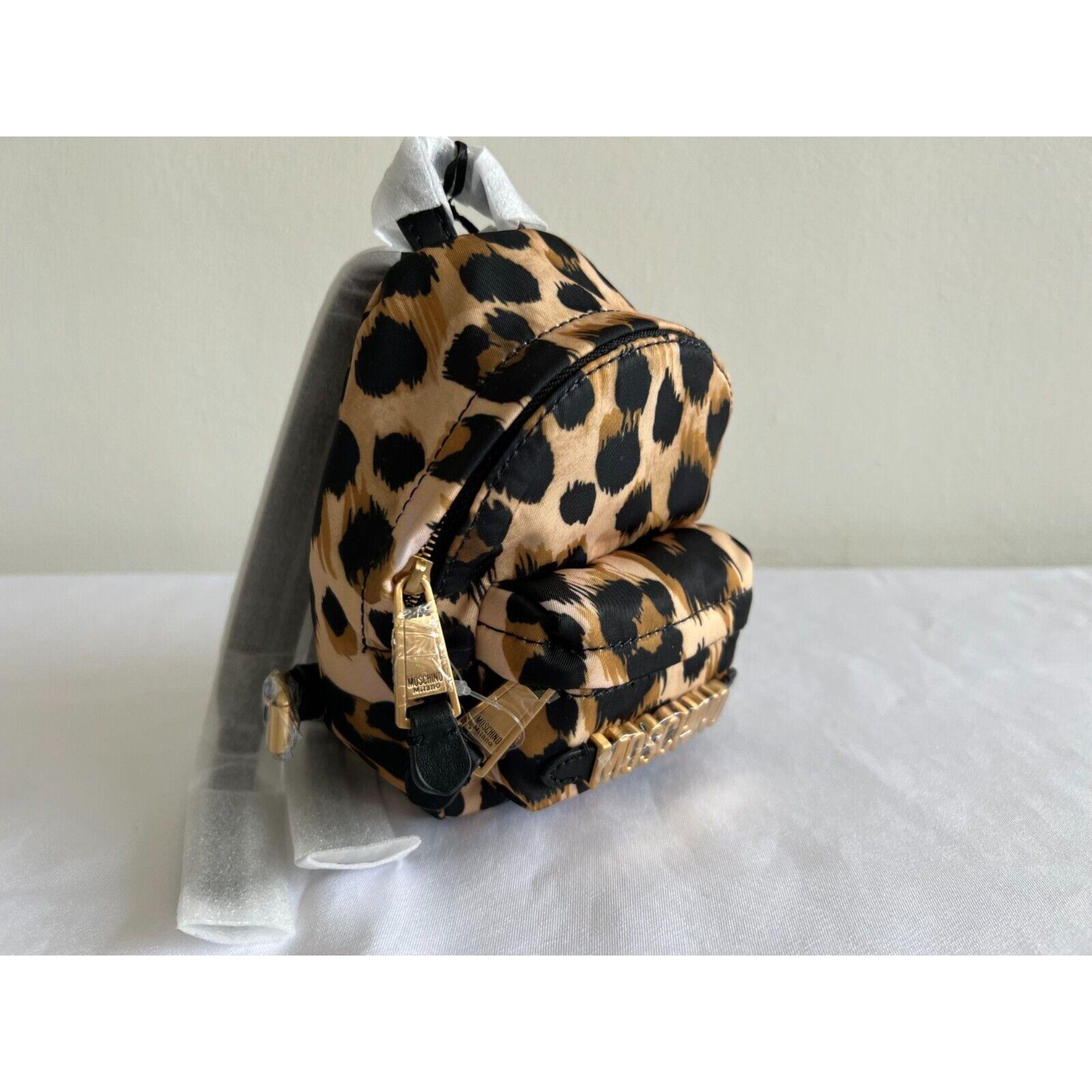 Women's AW21 Moschino Couture Leopard Print Shoulder Bag Mini Backpack by Jeremy Scott For Sale