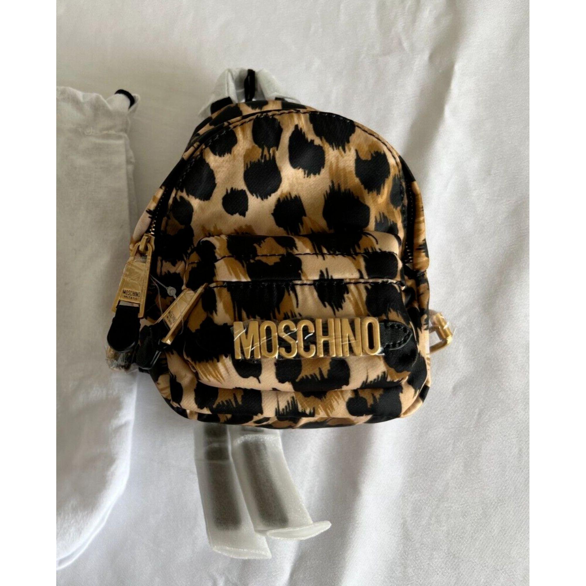 AW21 Moschino Couture Leopard Print Shoulder Bag Mini Backpack by Jeremy Scott For Sale 1