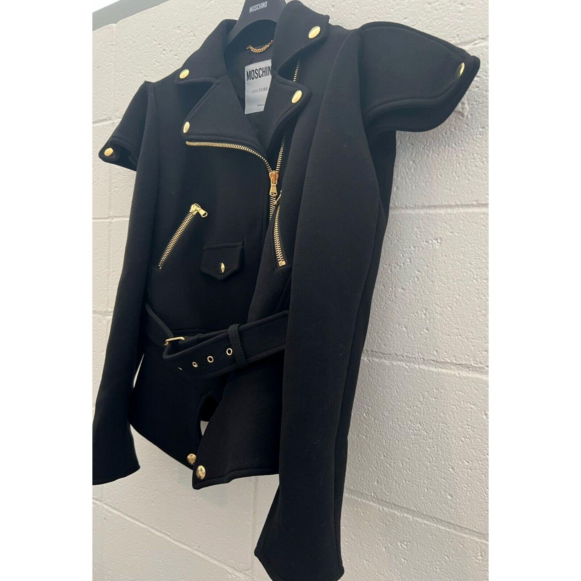 AW21 Moschino Couture Jeremy Scott Black Viscose Jacket/Coat with Gold Hardware

Additional Information:
Material: 100% Viscose
Color: Black
Size: IT 42 / US 8
Pattern: Solid
Style: Overcoat
Dimensions: Shoulder to shoulder 16