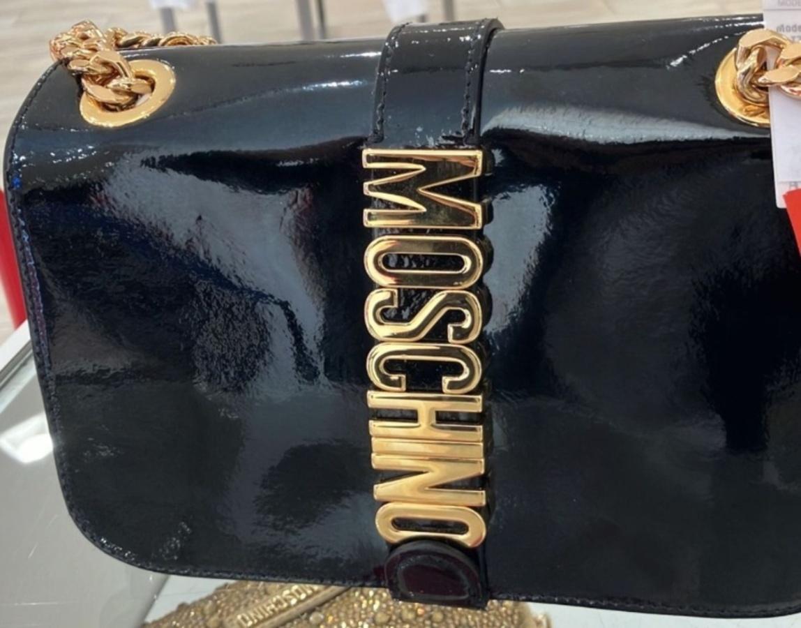 AW22 Moschino Couture Jeremy Scott Borsa a tracolla in pelle con logo verticale nero in vendita 1