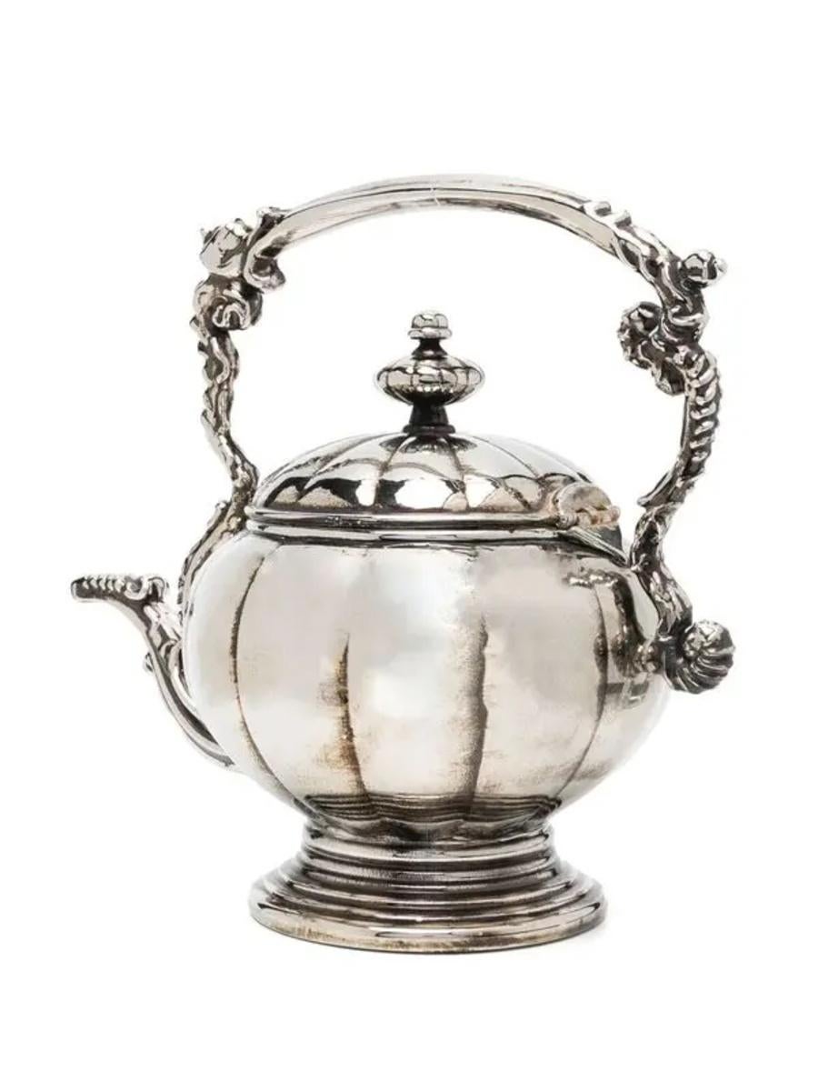 Gray AW22 MOSCHINO Couture Jeremy Scott Logo Engraved Teapot Metallic Clutch Handbag