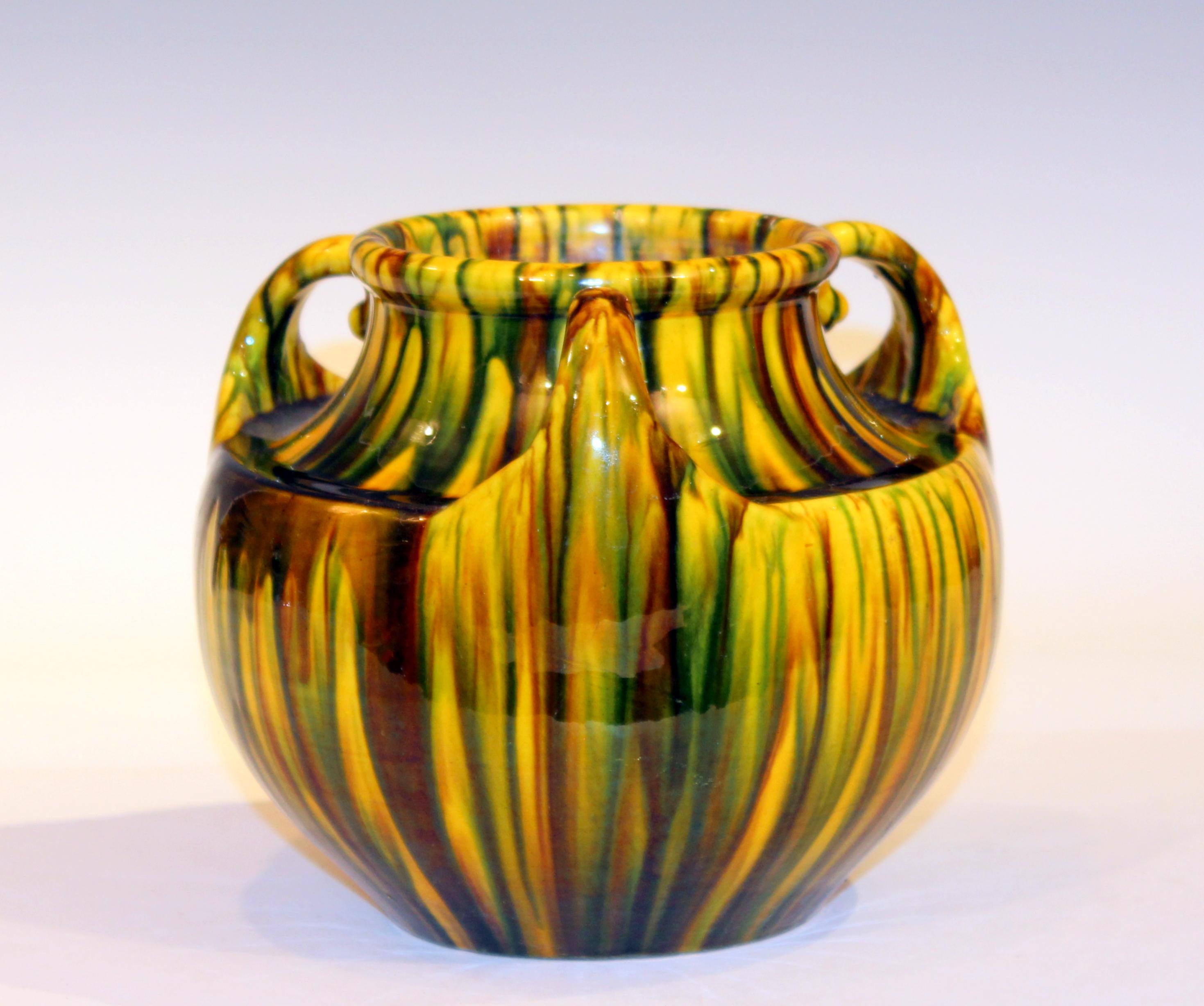 Awaji Pottery vase in Art Deco form with three curled up handles and striking yellow flambé glaze, circa 1930. Impressed marks. 6