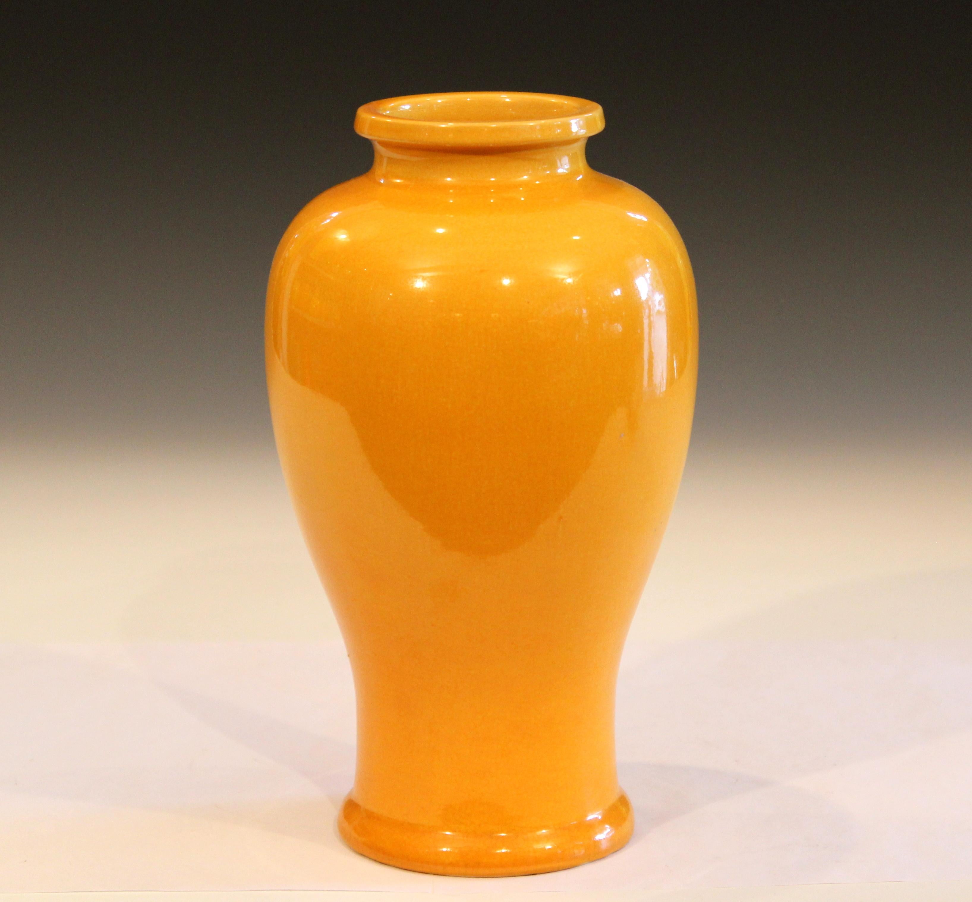 Awaji Pottery vase in finely crackled warm yellow glaze, circa 1930. Impressed export mark. Measure: 8 3/4