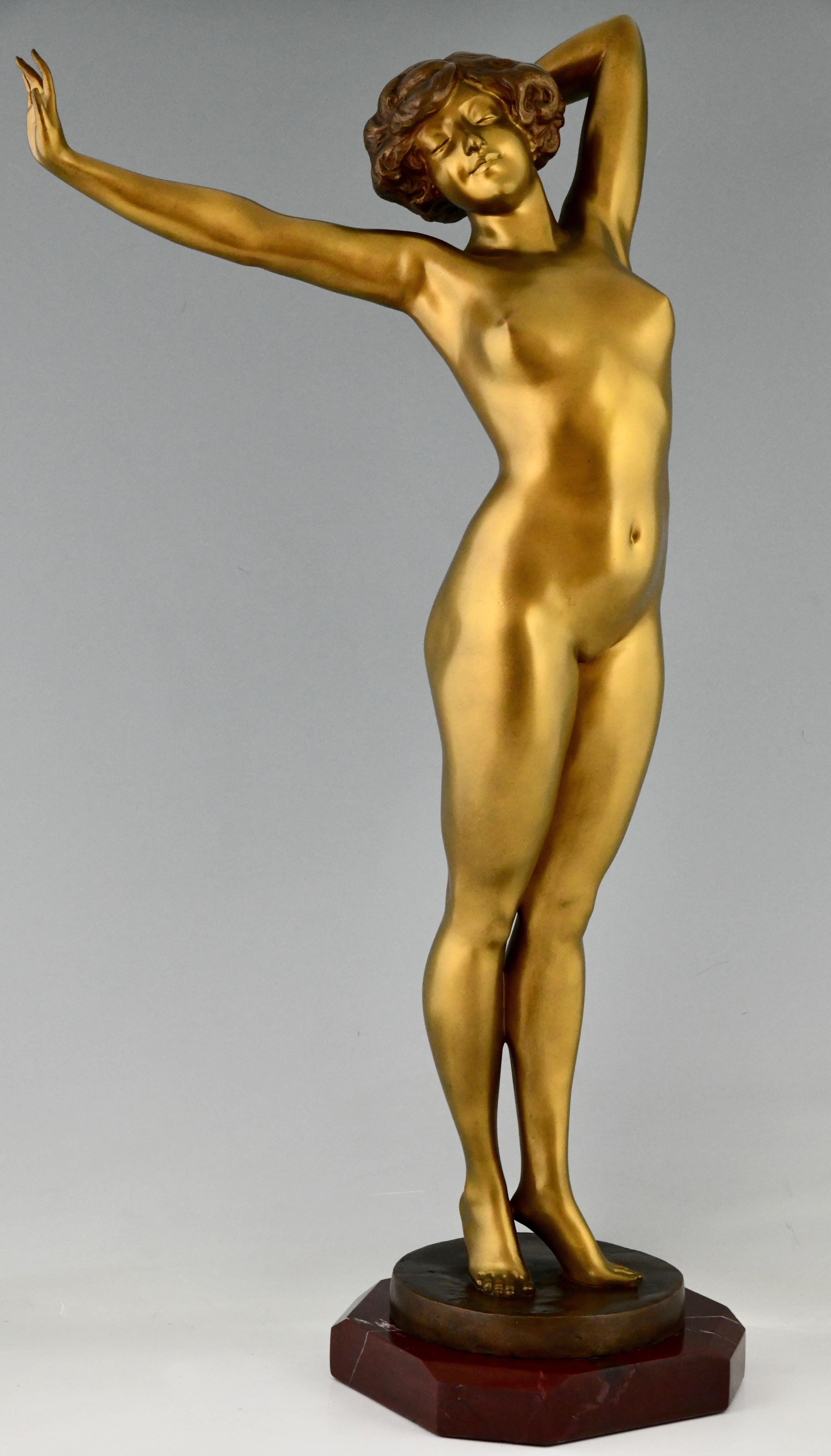 Awakening Art Deco bronze sculpture nude, young woman streching signed by Paul Philippe. 80 cm or 32 inch tall bronze on Belgian red marble base. 
Also called Le Reveil, France 1920. 

Impressive size.

This sculpture is illustrated in: Art