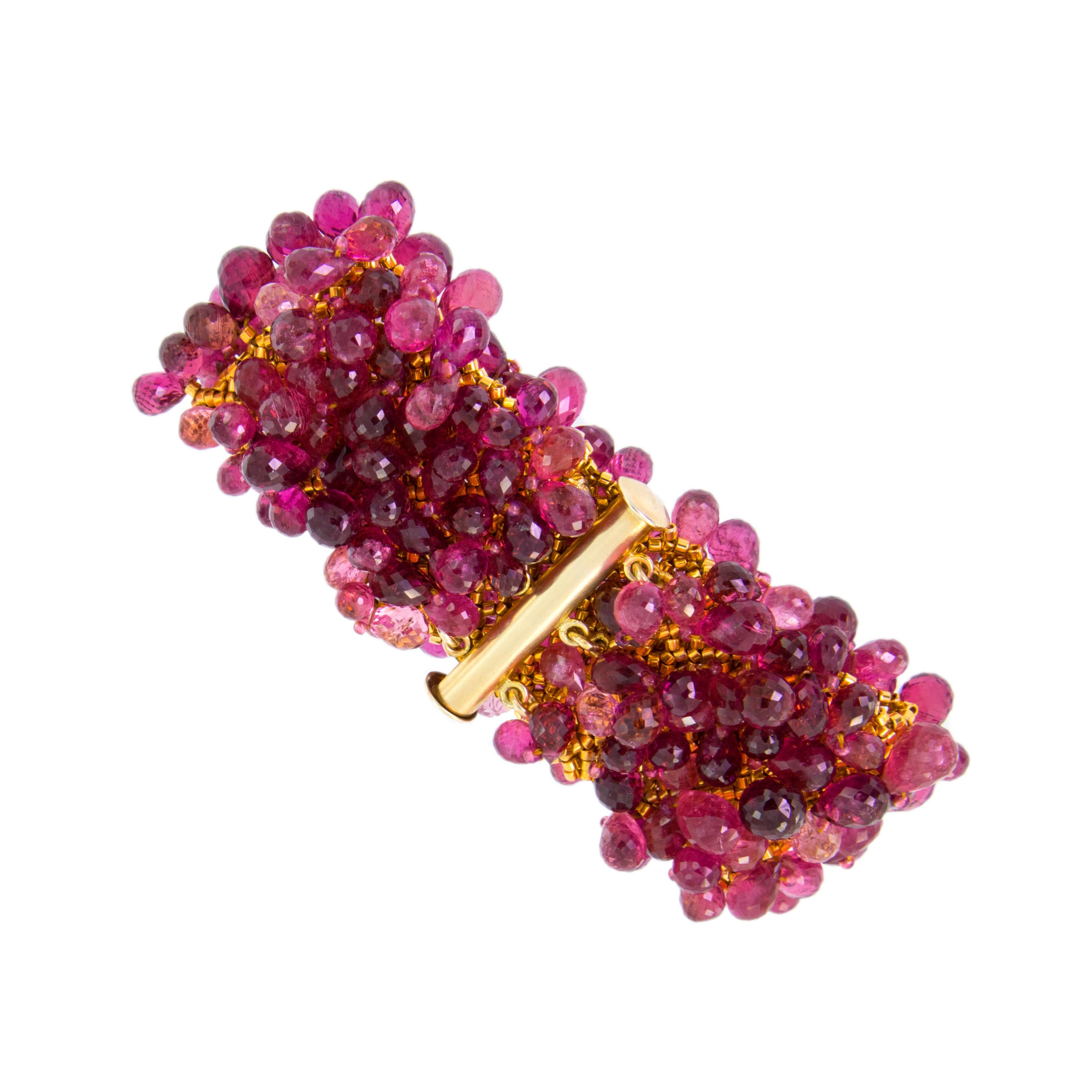 Beautiful hand-woven bracelet with faceted briolette pink tourmaline beads = 327.70 Cttw. with gold plated vermeil clasp.  Designed and handmade by Susan Hoge.