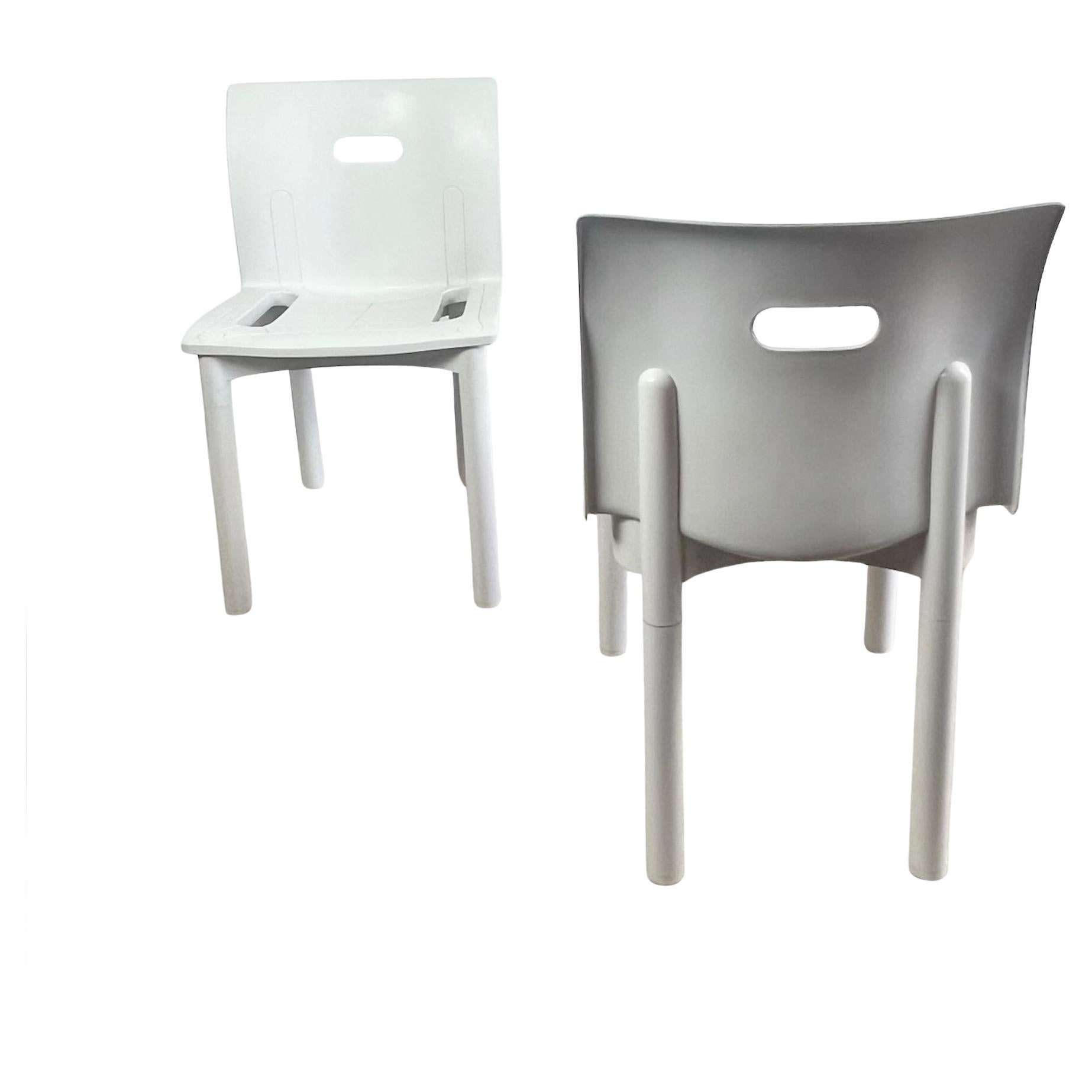 Pair of award-winning stackable chairs Kartell 4870, designed by Anna Castelli Ferrieri for Kartell in 1986.

This beautiful model was awarded with the ‘Compasso D’Oro’ 1987. The design of this chair blends a rigorous form with a hint of joyful