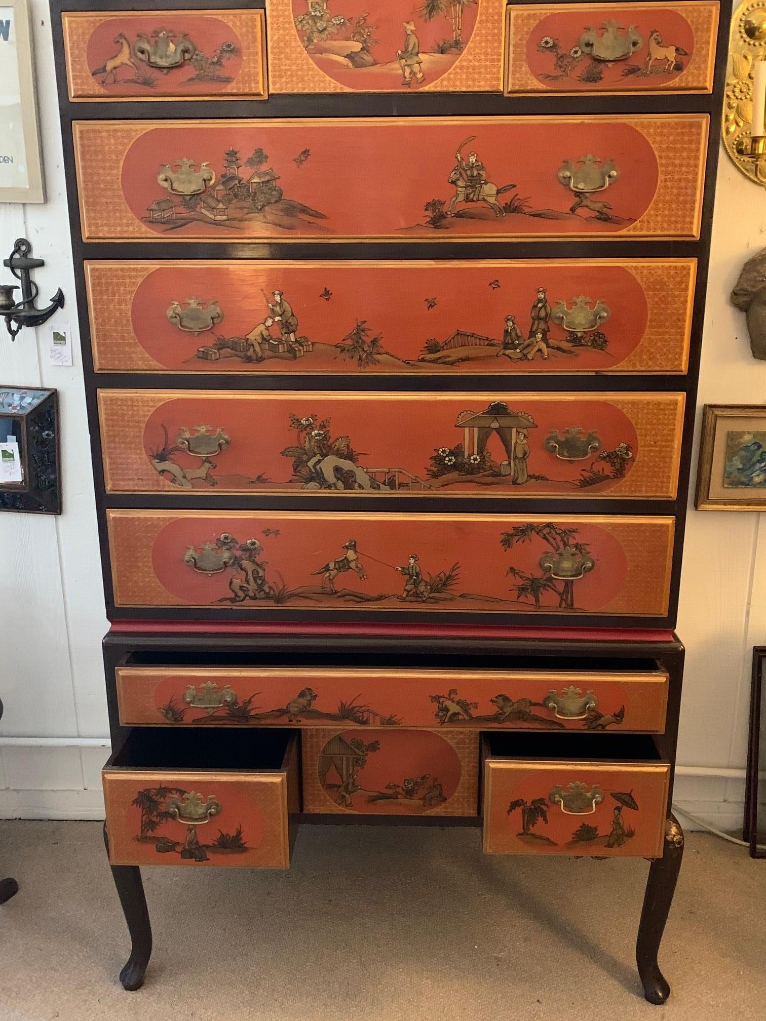 A show stopper magnificent chinoiserie 9 drawer highboy in a striking color palette of brown and two shades of warm orange. The hand painted embellishments are in black and gold leaf having raised figures, pagodas and bamboo with Chippendale style