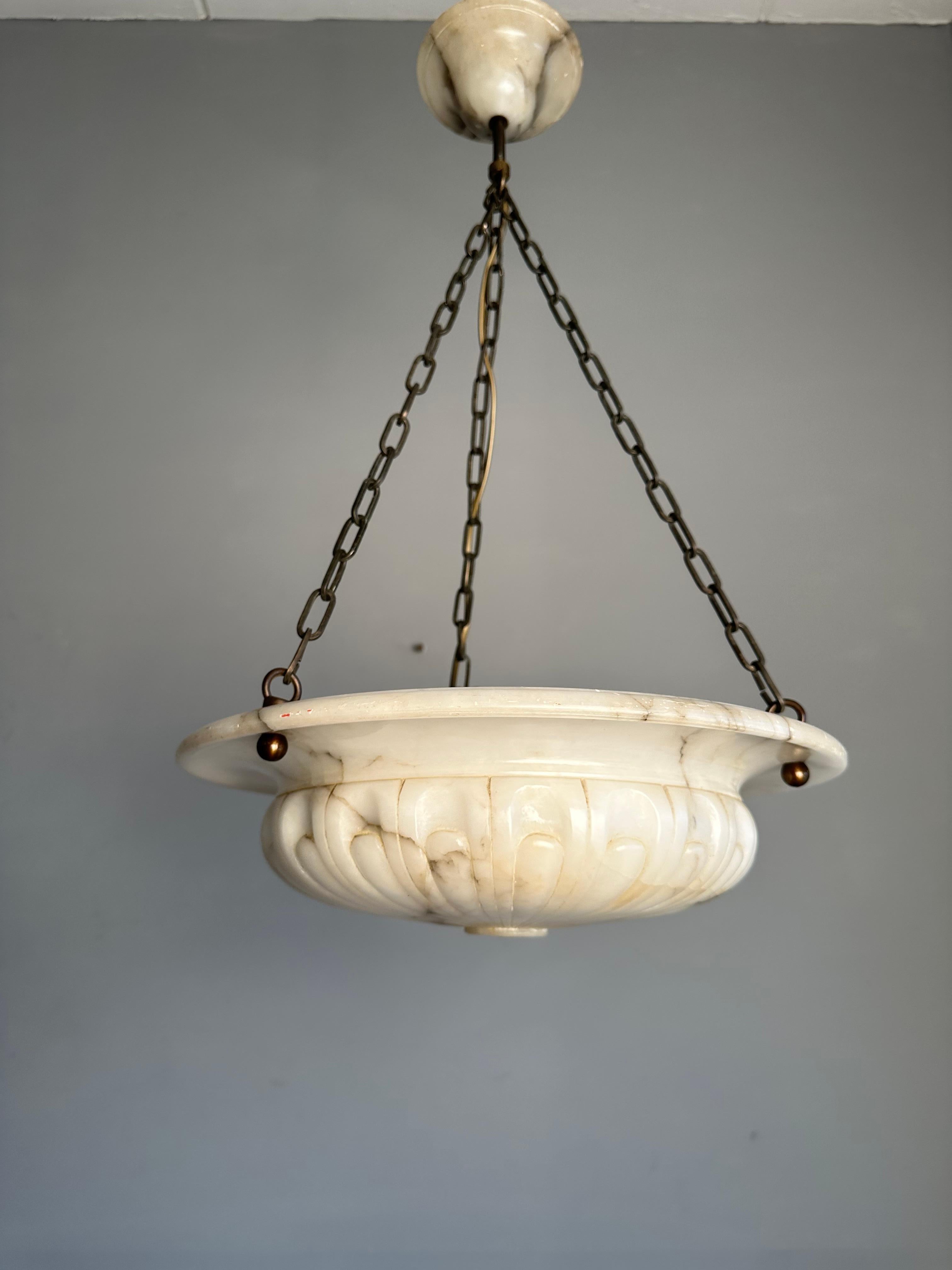Marvelous antique and classical design light fixture for an entry hall, bedroom or any other room.

With these alabaster pendants being one of our specialities, we always love finding the timeless ones. This particular work of beauty comes with a