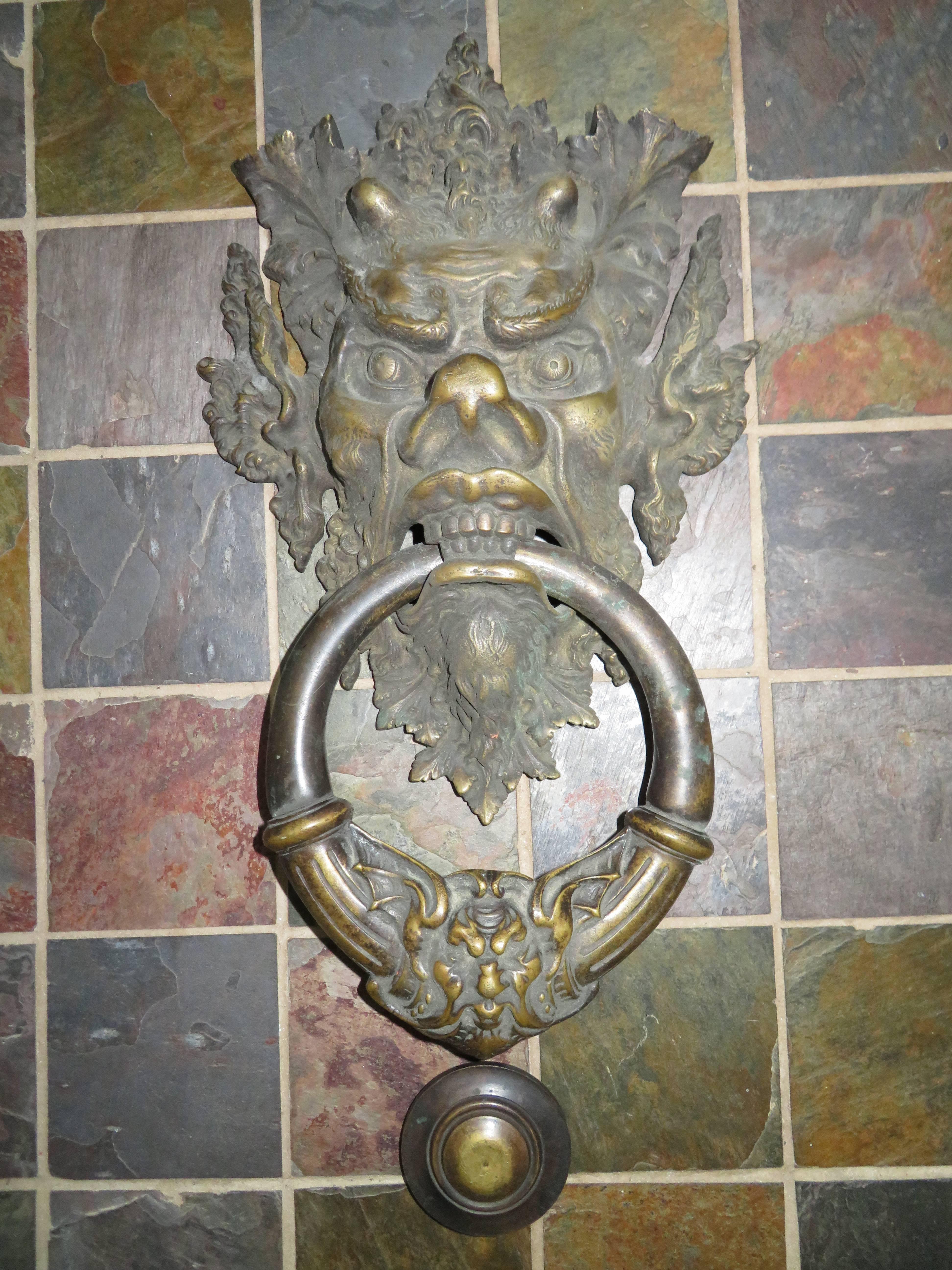 Awesome large-scale antique Italian bronze Vecchio Greenman door knocker. With a resonant knock worthy of the great hall of any castle, this truly massive piece is not for any ordinary door! This is an original bronze piece from the turn of the