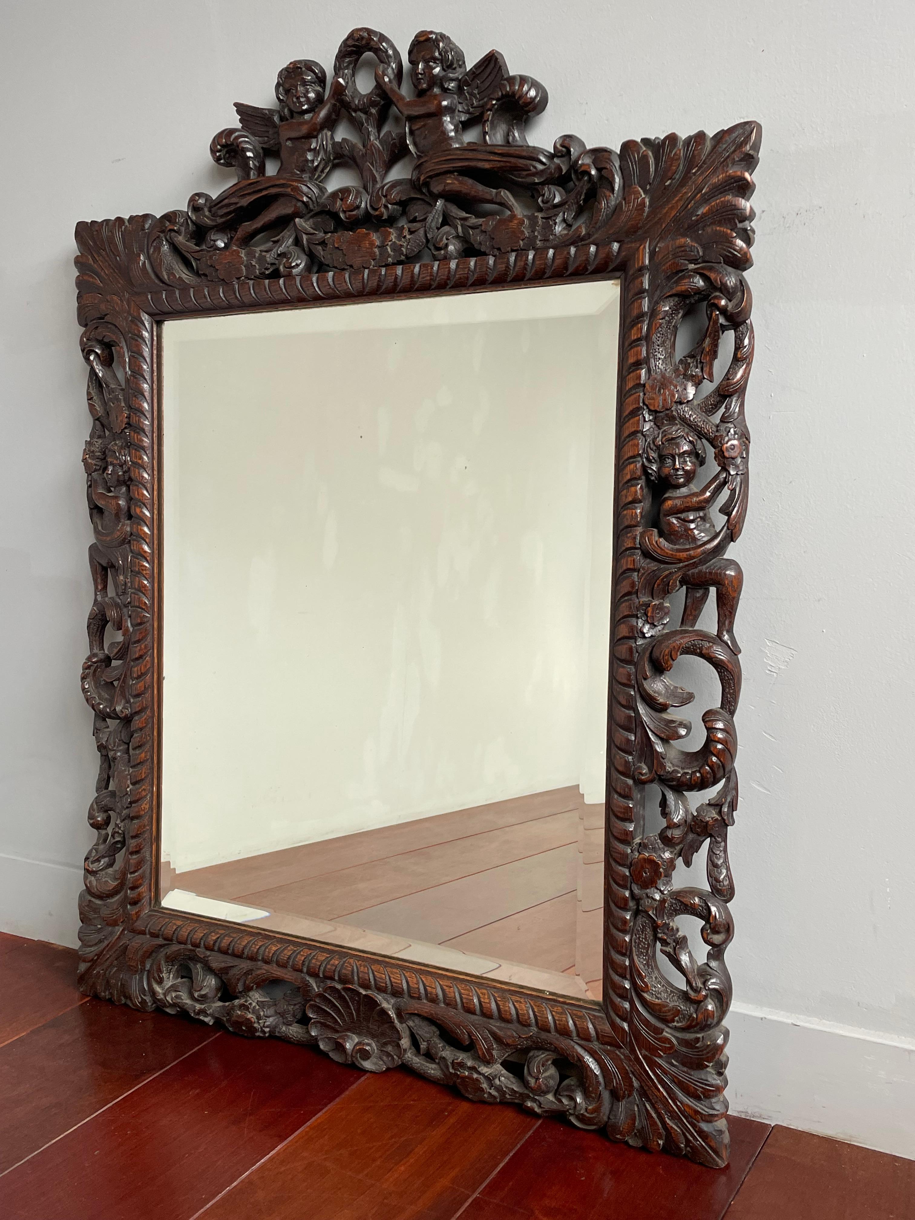 Great quality carved and ideal size Renaissance Revival wall or mantel mirror.

If you are familiar with style elements of the Renaissance era then you will immediately recognize this good size mirror as a Renaissance Revival antique. In this