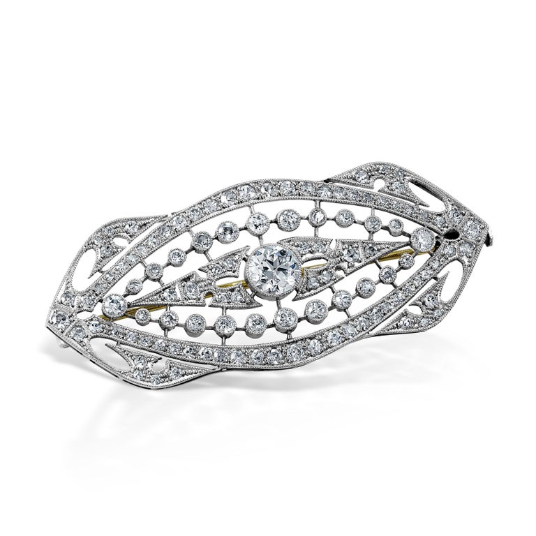 Simply Beautiful! Finely detailed Art Nouveau Diamond White Gold Brooch. Beautifully Hand crafted with migraine details in 18K White Gold. Hand set with 109 Diamonds weighing approx. 2.25 total Carat weight. Hand crafted in 18K White Gold. Measuring