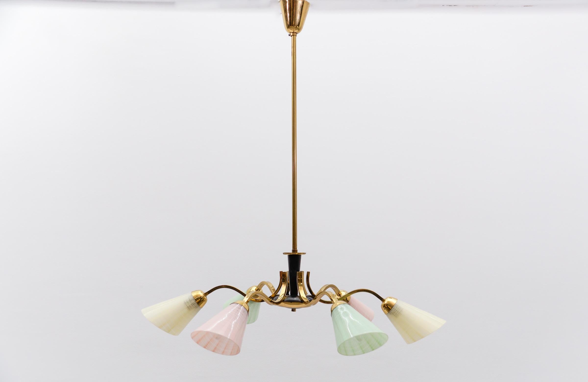 Awesome Multicolored Spider Lamp in the Manner of Arteluce, 1950s

Rare and elegant midcentury Sputnik lamps, 1950s. Executed in metal, brass and acrylic.

The usual slight signs of wear and a beautiful patina.

The lamp is executed with 6 x E14