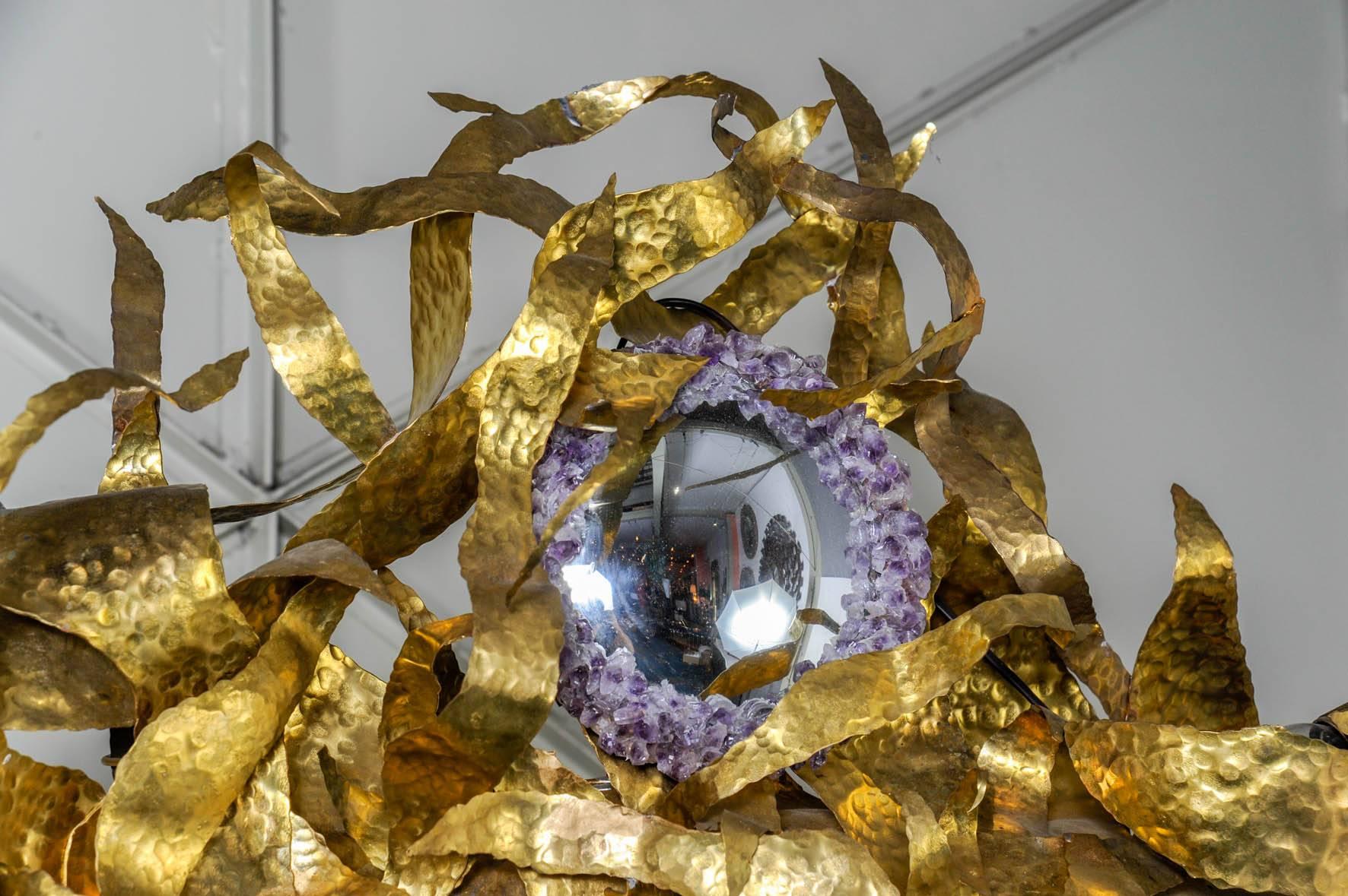 Sculptural brass mirror with amethyst crown around a small mirror 
Special order.
Measures: Depth 20 cm.
 