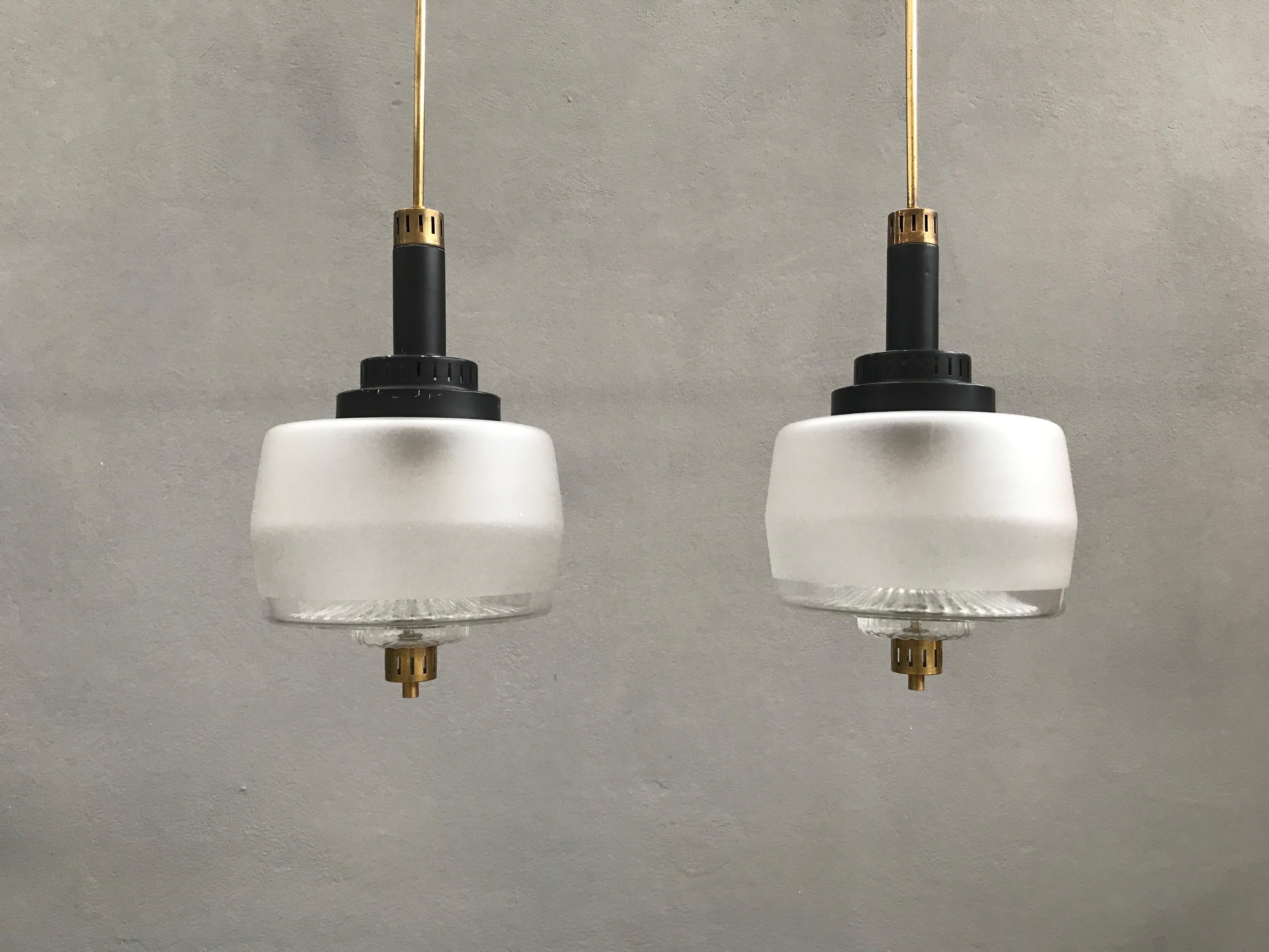 White opaline glass, black lacquered metal and brass structure.