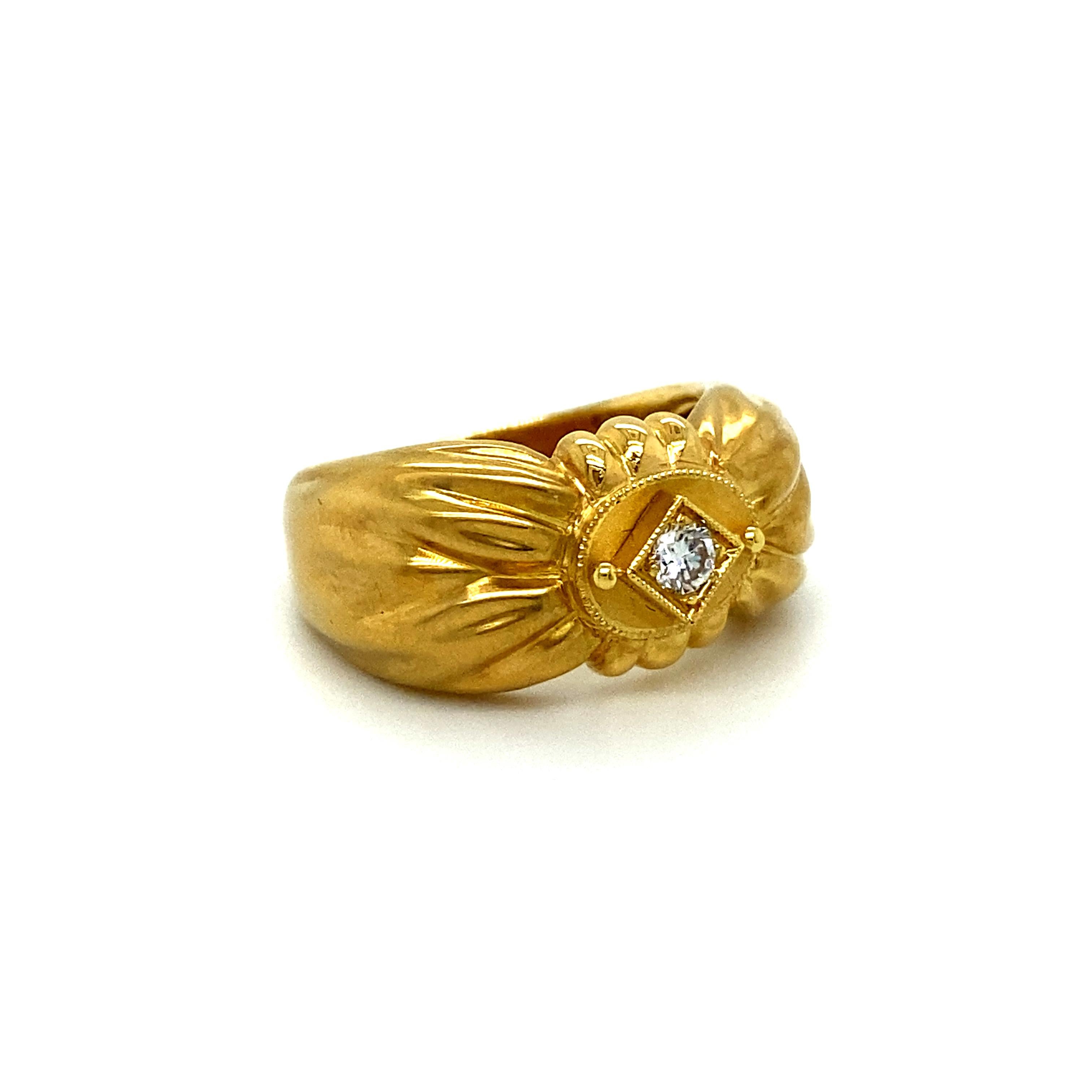 This Awesome Vintage Diamond Bow Ring has so much style, I just can't stop looking at it! Crafted in 18K Yellow Gold, the design features a heavy 80's style bow with a diamond center! In the center, the ring hold a Round Brilliant Cut Diamond,