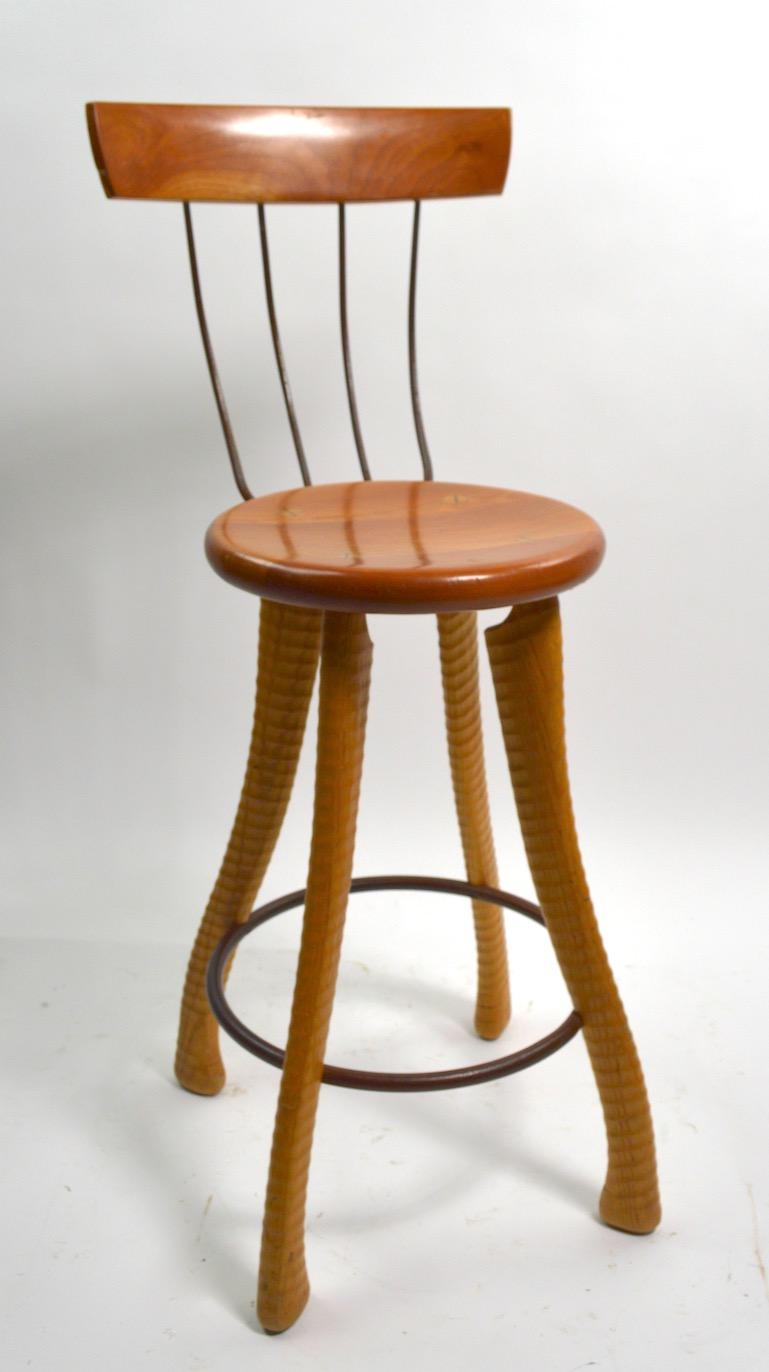 Nice Folk Art furniture by noted repurpose designer Brad Smith (Marked Bradford Farm Fresh Furniture). Structurally sound and sturdy, shows some cosmetic wear to finish normal and consistent with age. Measures: Seat height 25.5 inches.
 